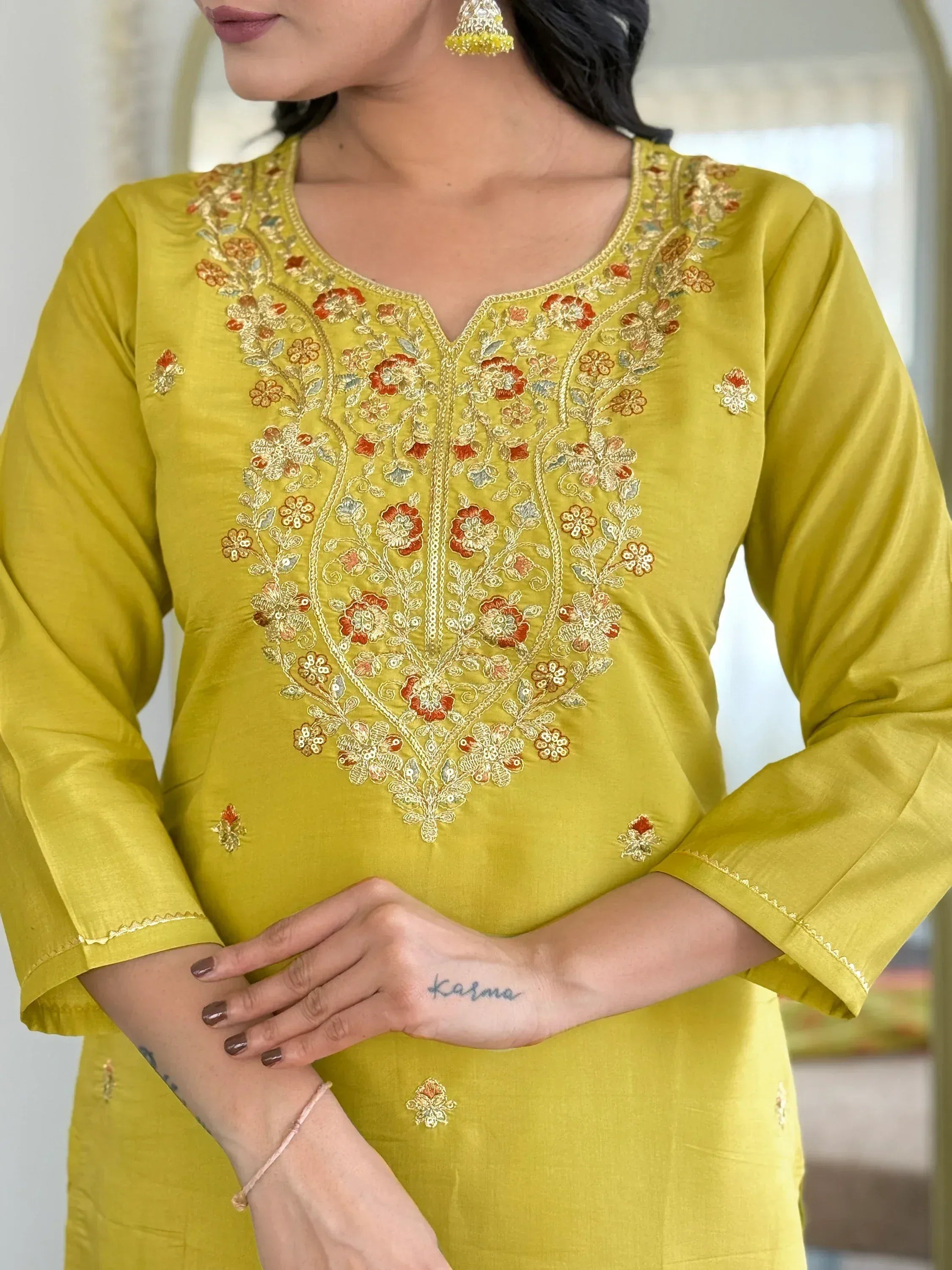Yellow embroidered kurti with floral design, perfect for Indian ethnic wear