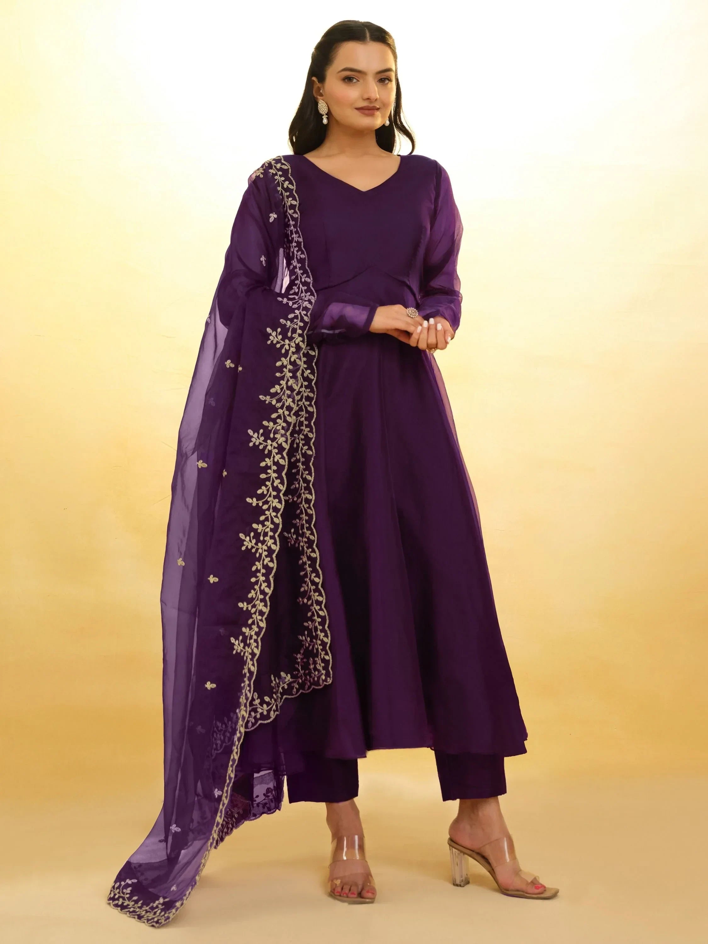 Woman wearing purple embroidered salwar kameez with dupatta, Indian ethnic wear