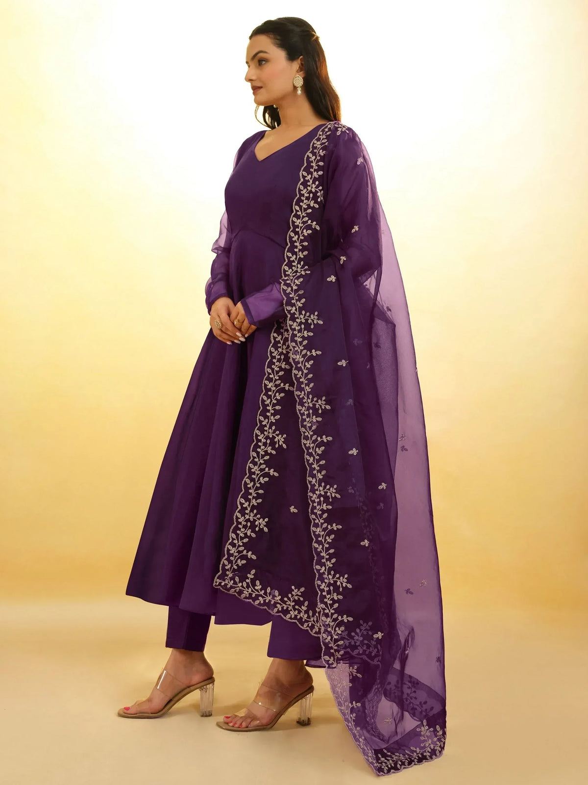 Purple ethnic anarkali suit with silver embroidery and sheer dupatta, perfect for Indian occasions