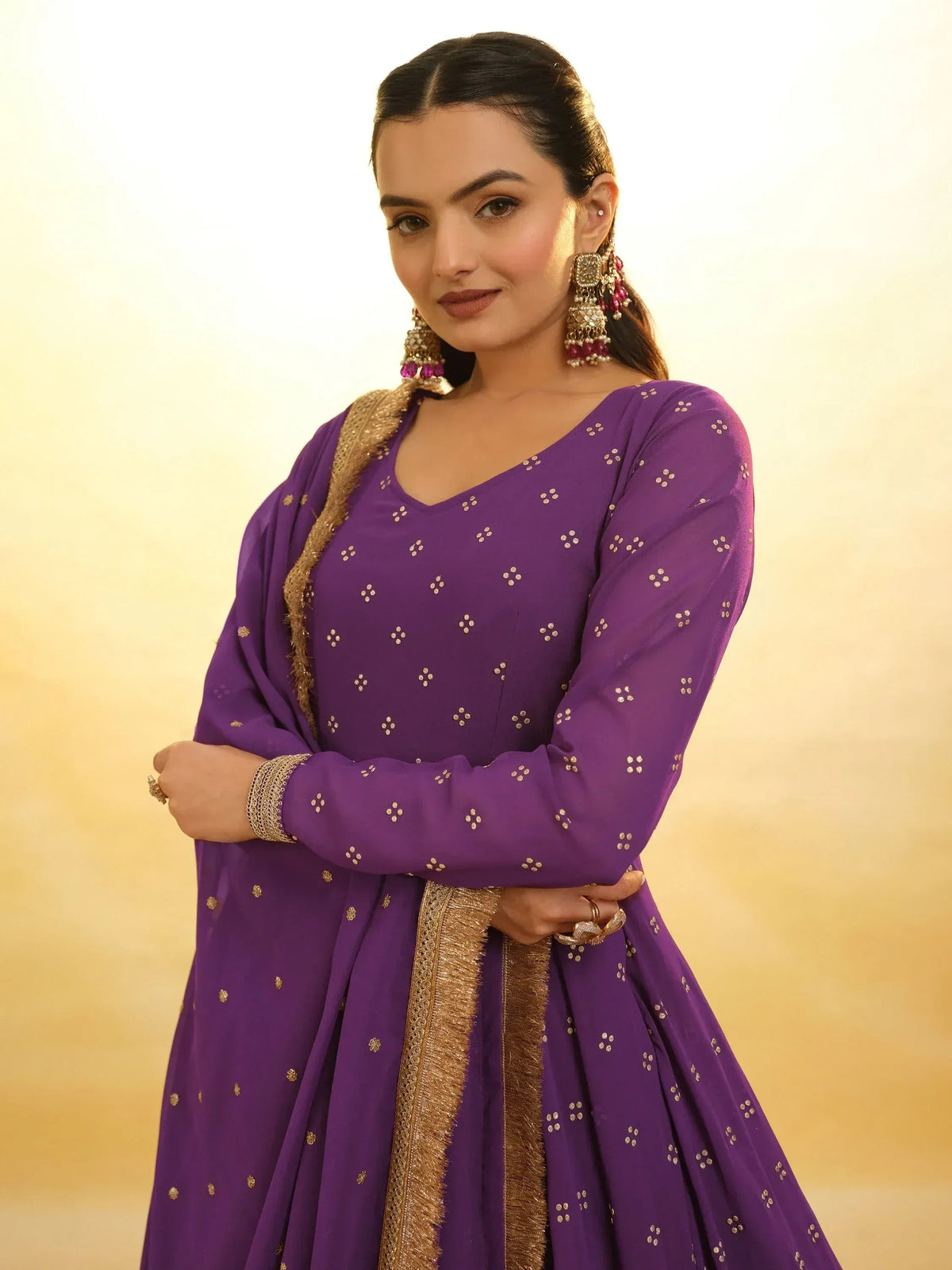 Purple ethnic anarkali with gold embroidery and dupatta, perfect for Indian occasions
