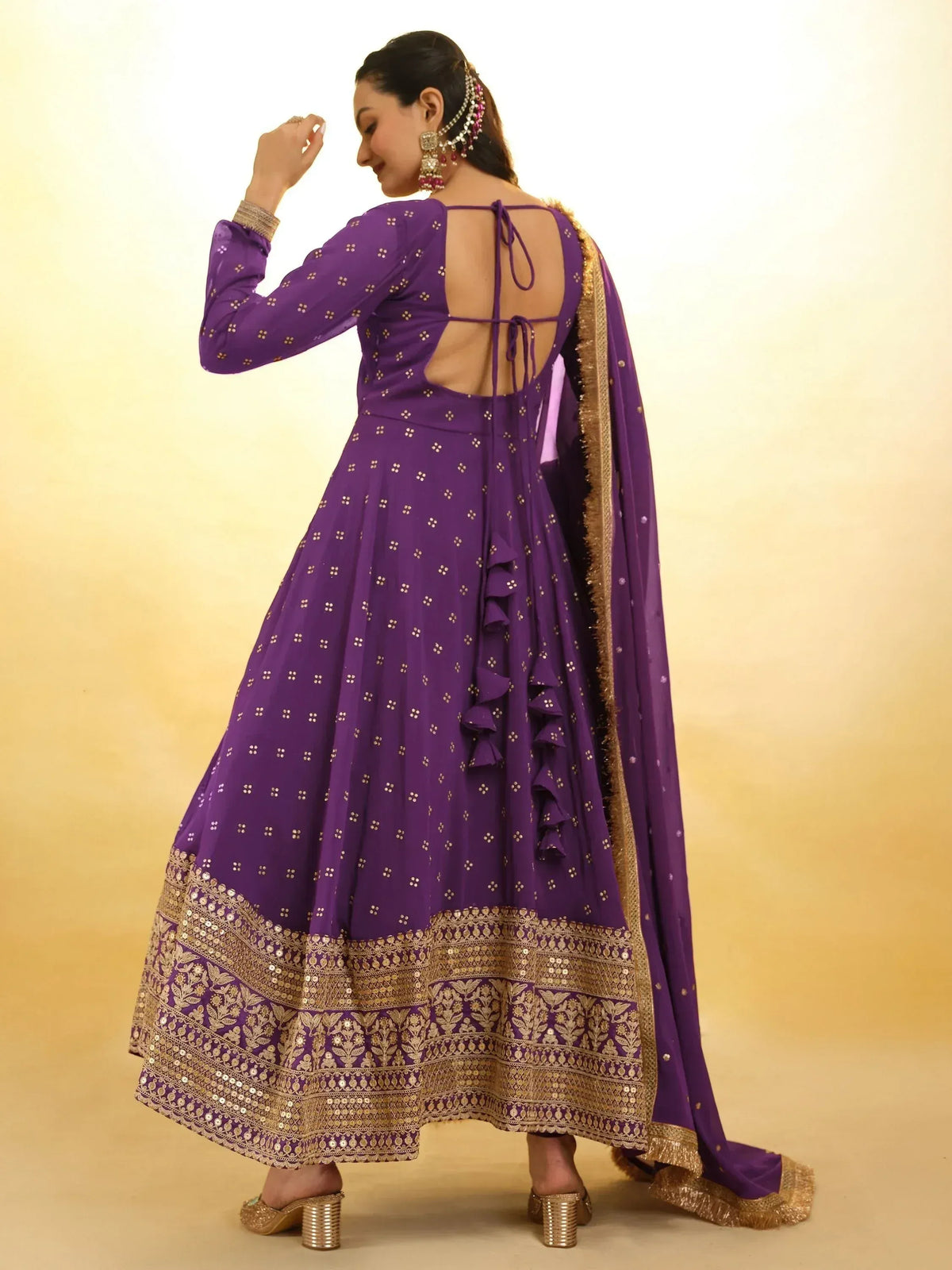 Purple designer anarkali with gold embroidery, back tie detail, and ruffle hem for Indian ethnic wear