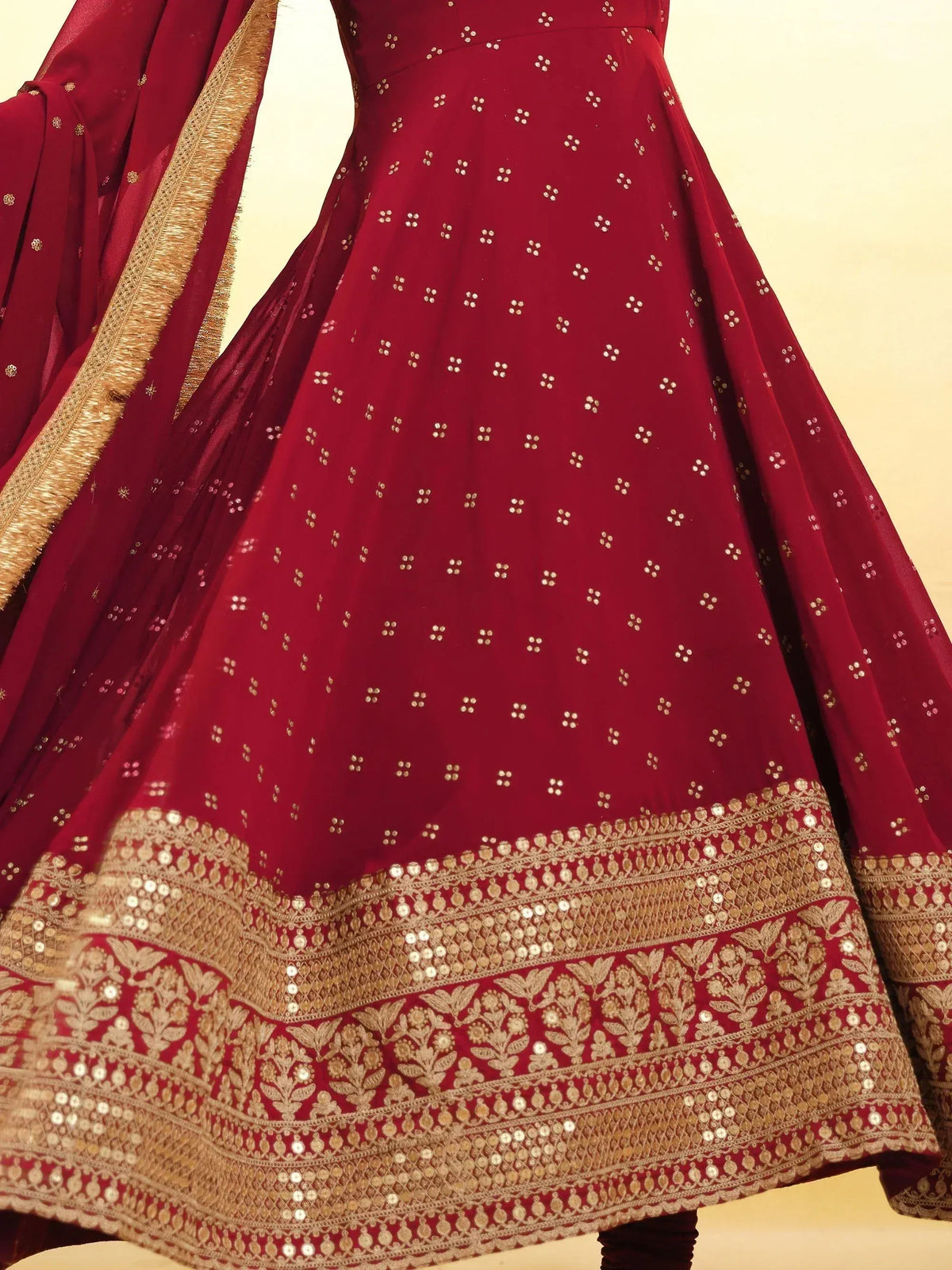 Maroon lehenga choli with gold embroidery and sequin work, perfect for Indian ethnic wear occasions