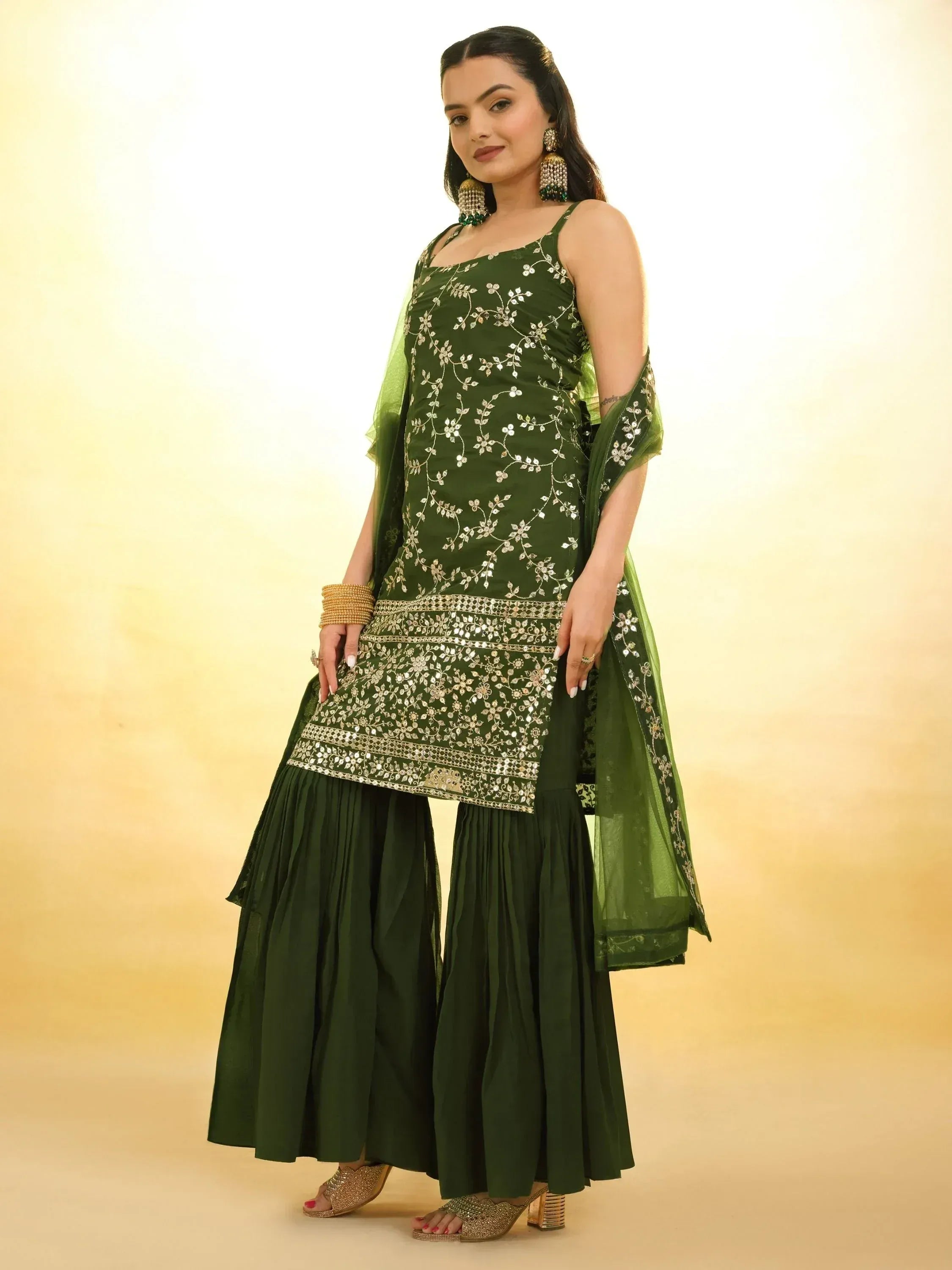 Green embroidered ethnic salwar kameez with palazzo pants and dupatta, perfect for Indian festive occasions.