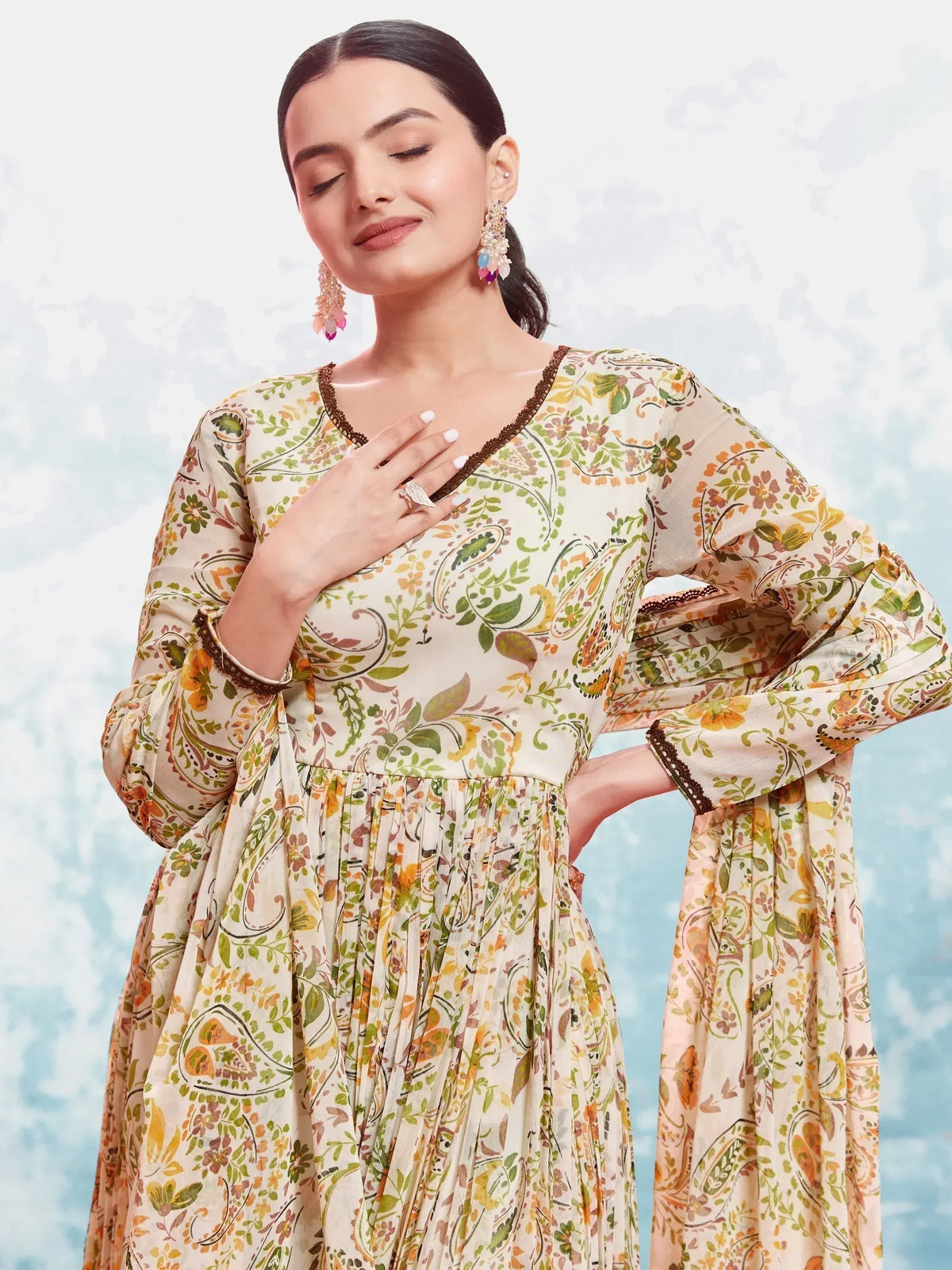 Floral print ethnic gown with bell sleeves and lace trim, perfect for Indian occasions