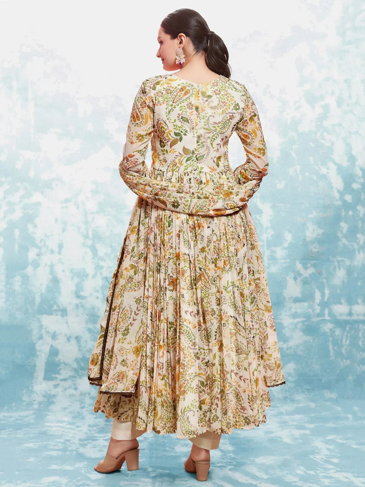 Floral printed ethnic gown with pleated skirt and long sleeves, perfect for Indian occasions