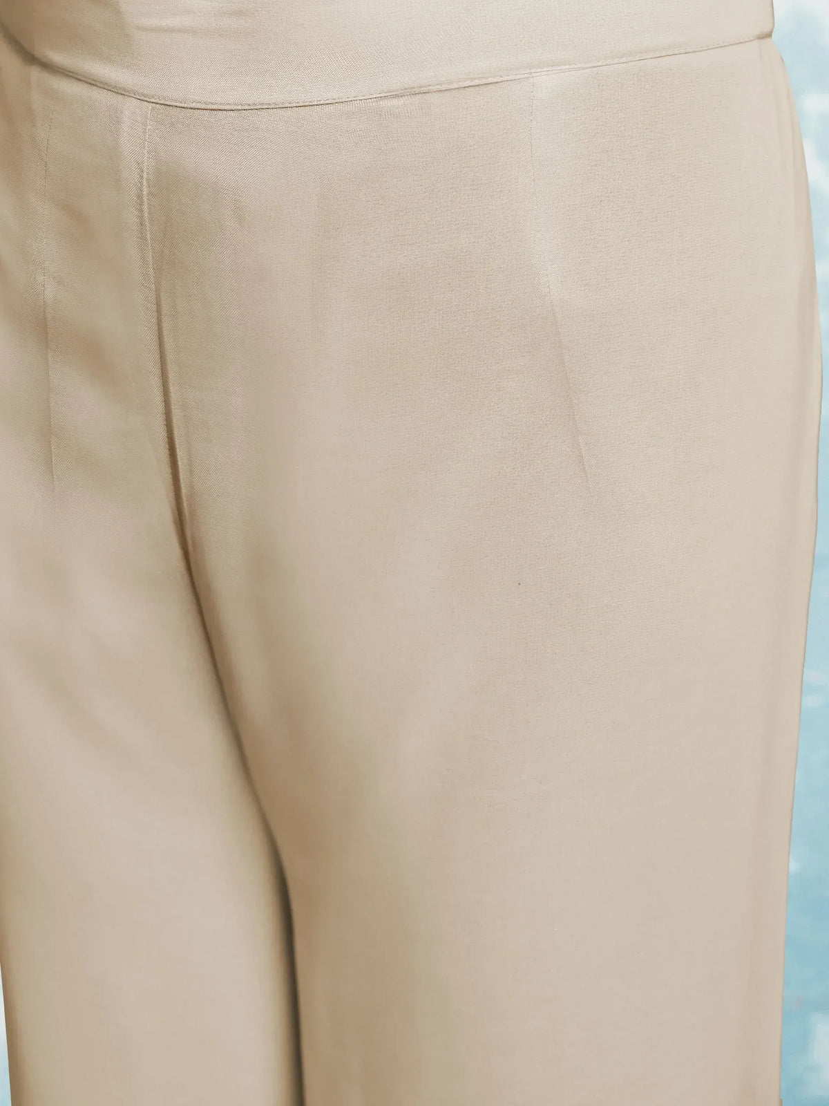 Beige high-waist palazzo pants with front pleats, ideal for ethnic wear and salwar kameez sets
