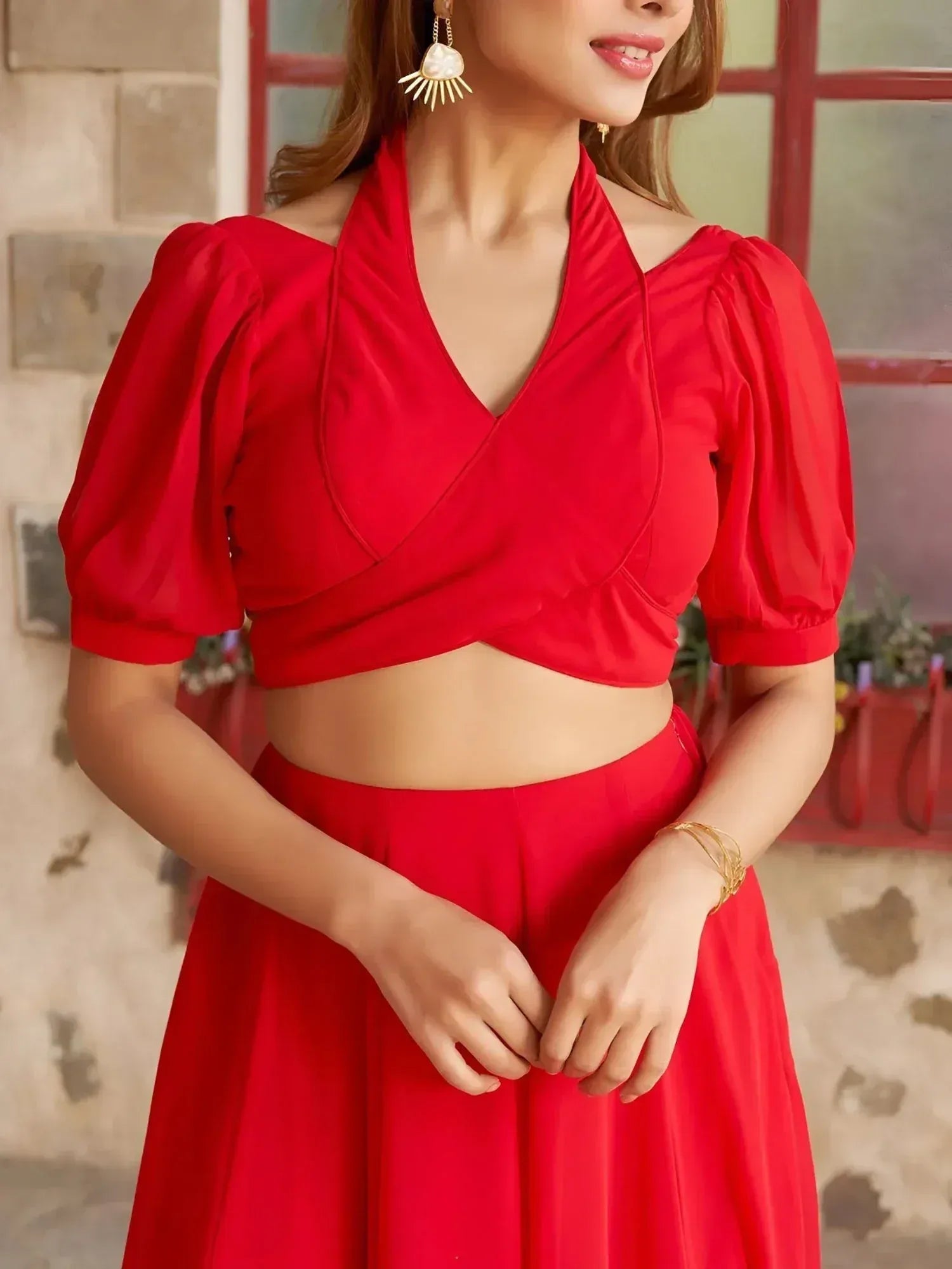 Red ethnic crop top with puff sleeves and matching skirt, perfect for Indian festive wear