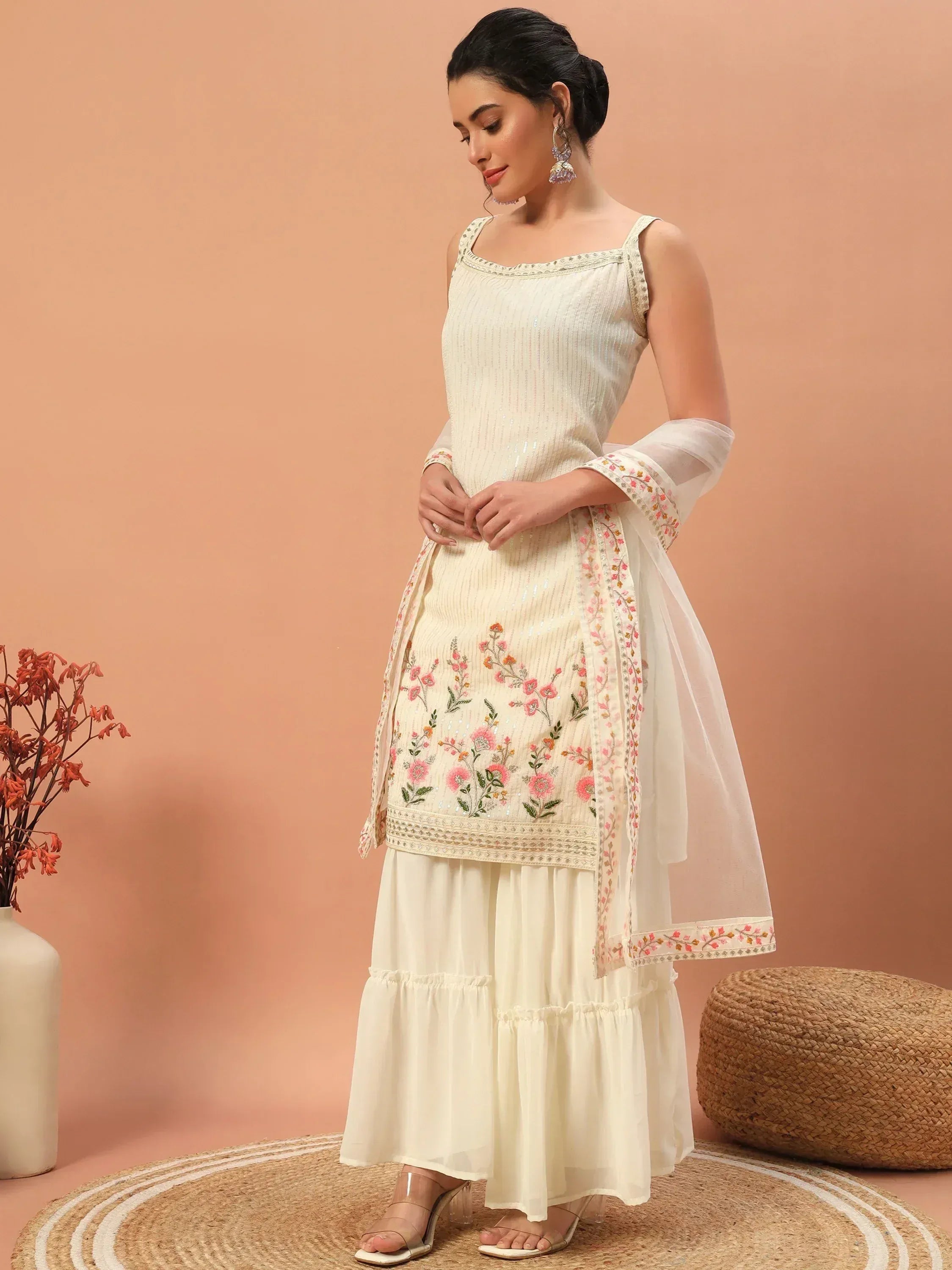 Cream embroidered salwar kameez with floral dupatta, perfect for Indian ethnic wear occasions