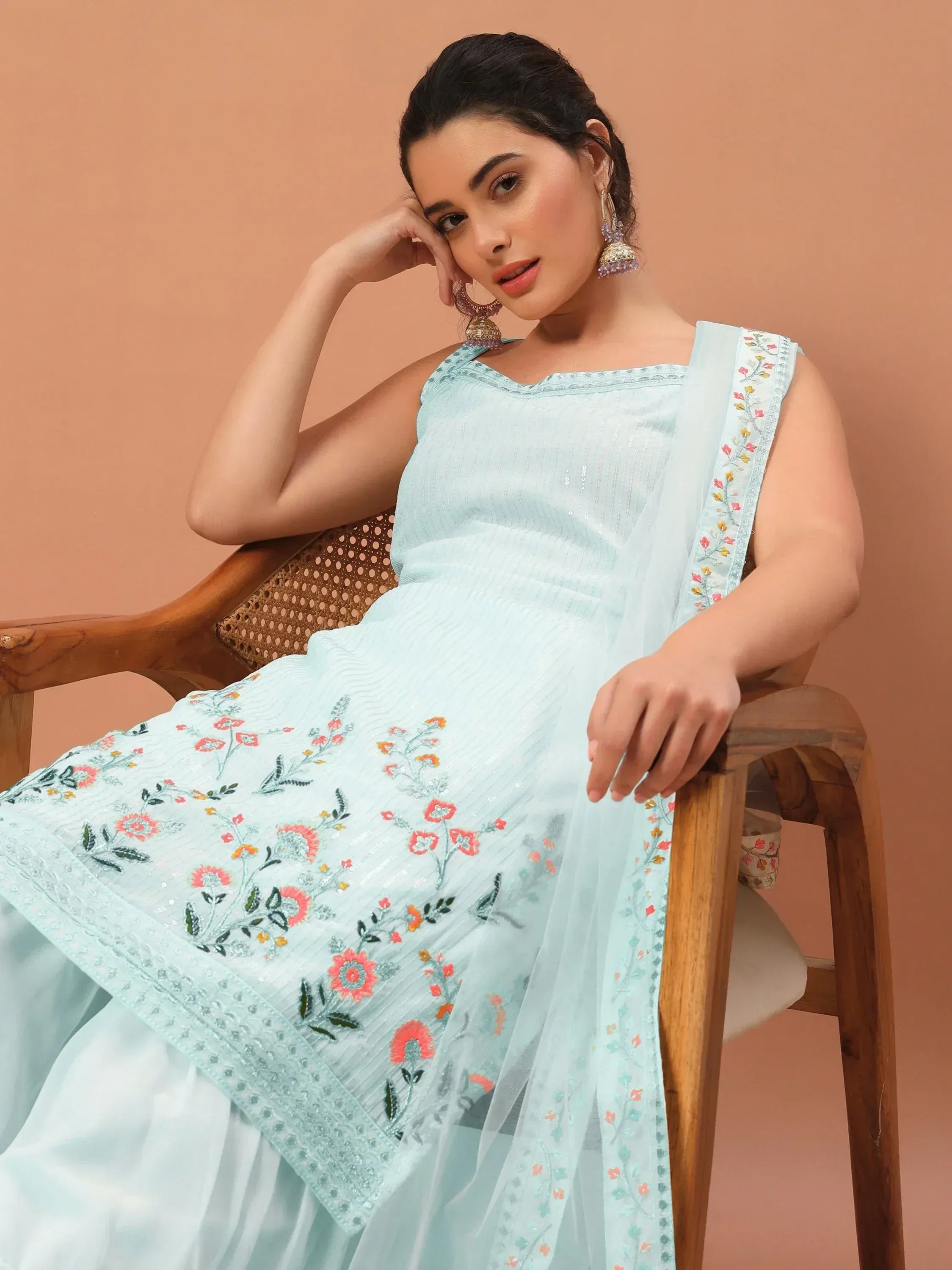 Light blue embroidered ethnic gown with floral dupatta, perfect for Indian occasions and festive wear.