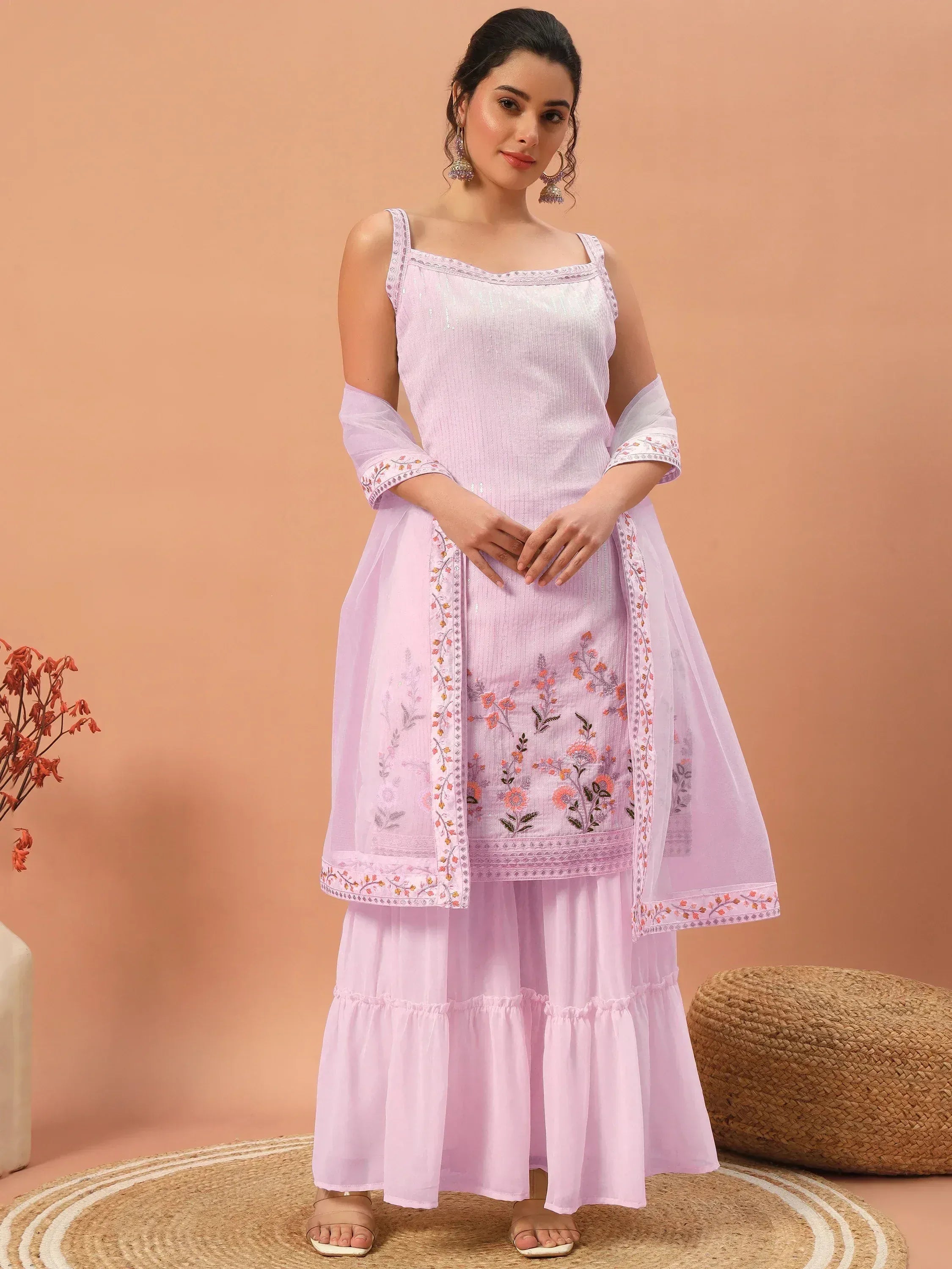 Light purple embroidered ethnic kurta with tiered skirt and dupatta, perfect for Indian festive wear