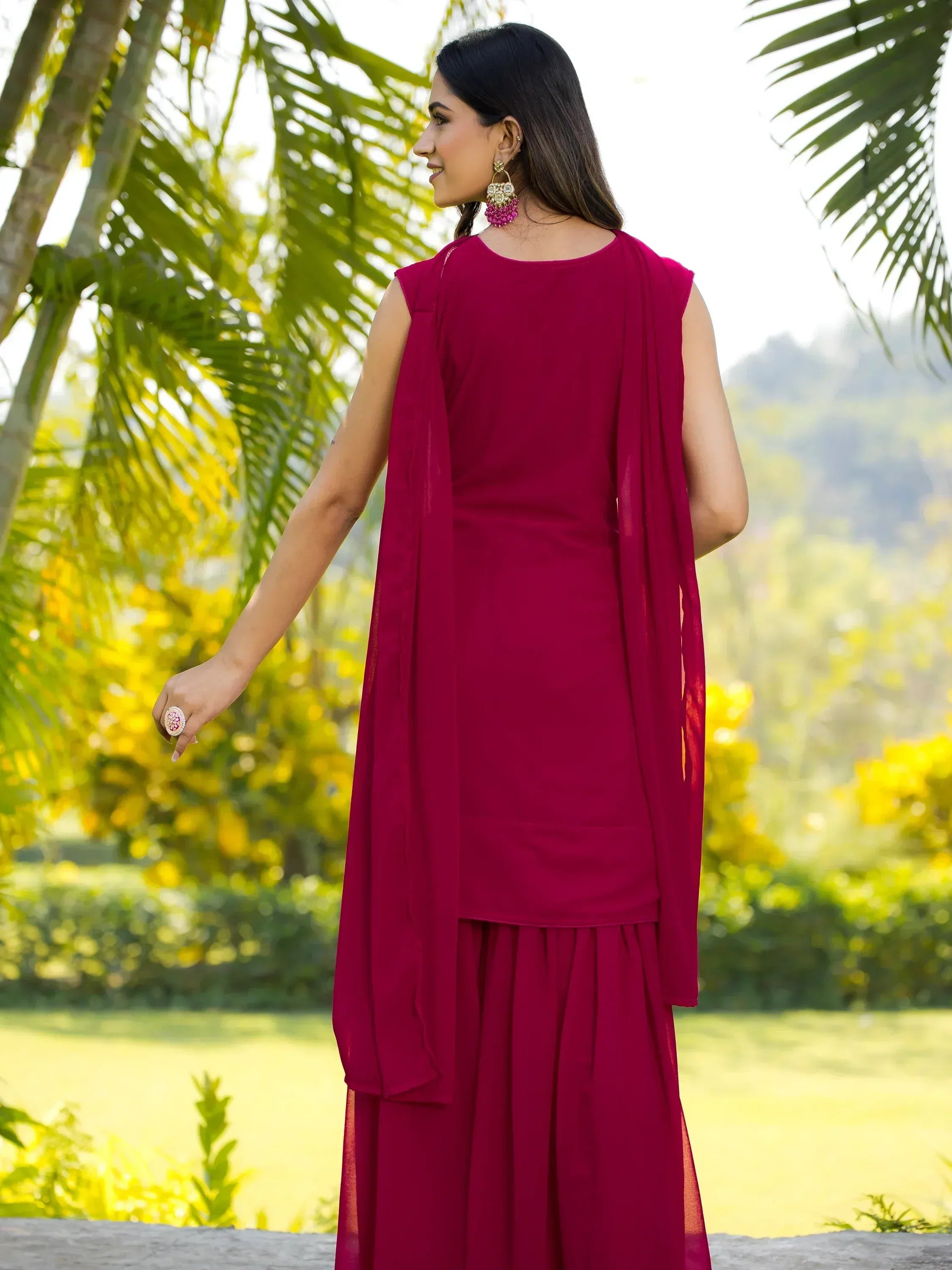Elegant maroon ethnic gown with matching dupatta, perfect for Indian festive occasions