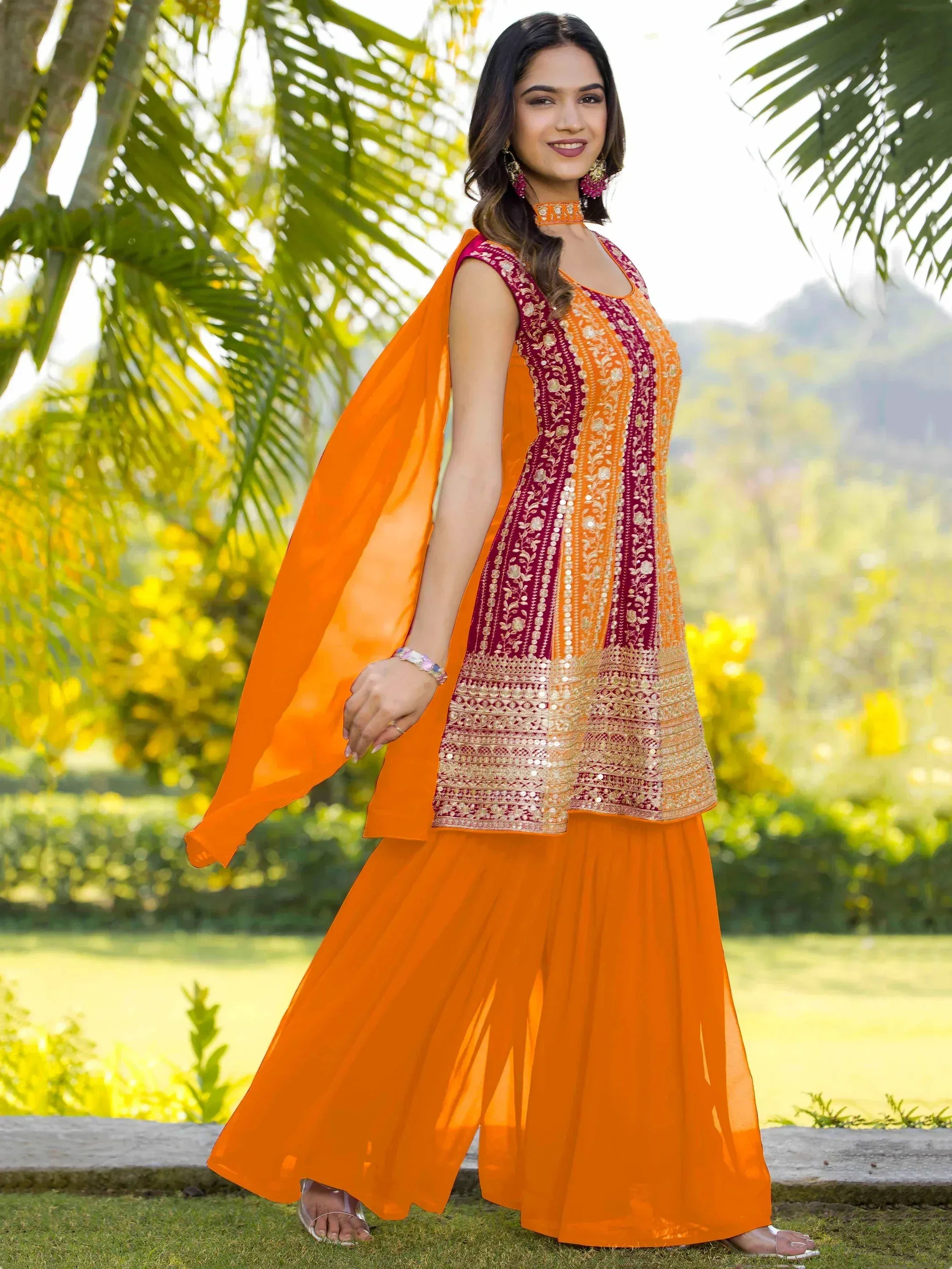 Orange and maroon embroidered ethnic salwar kameez with dupatta, perfect for festive occasions