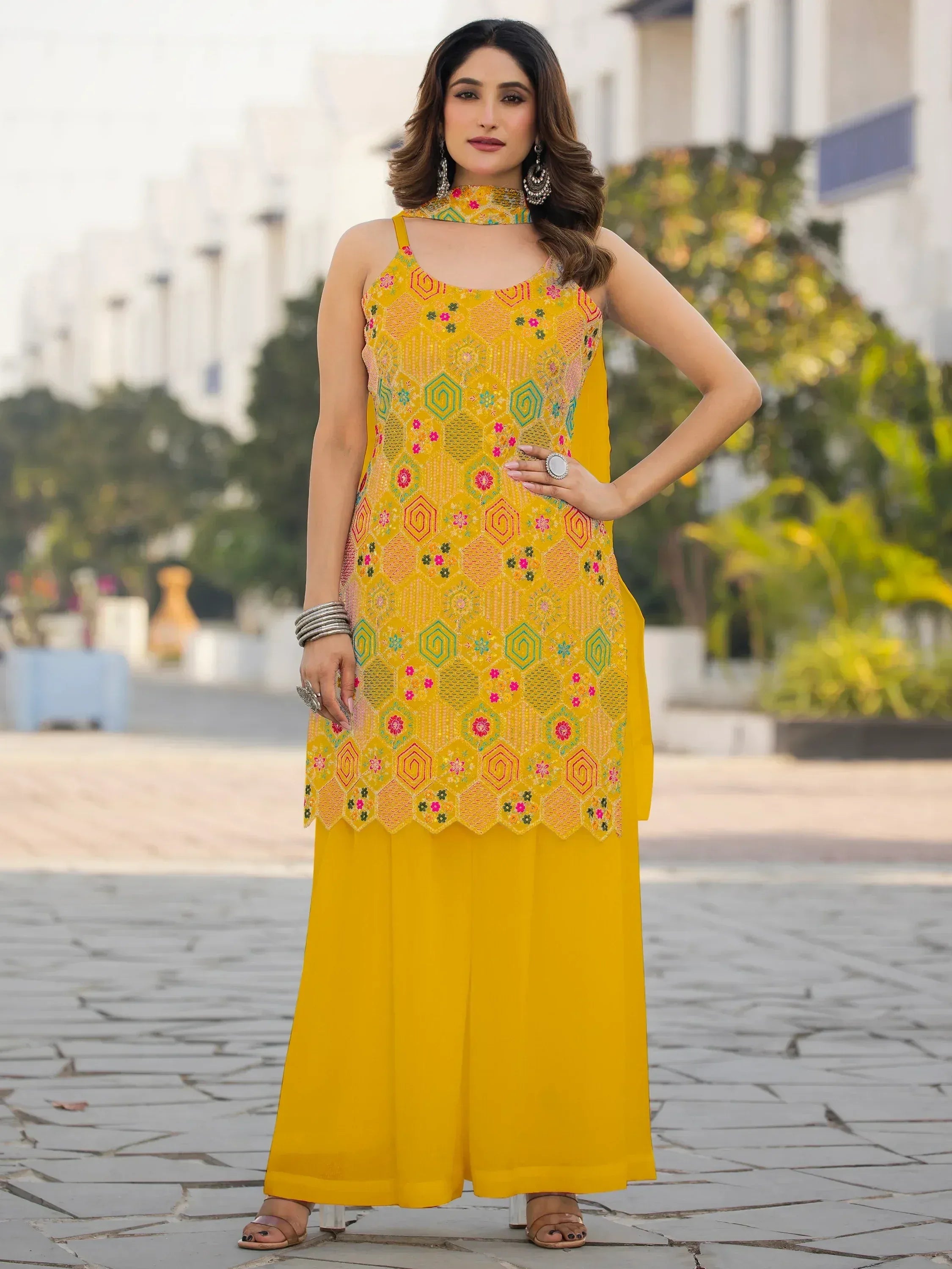 Yellow embroidered ethnic kurta with palazzo pants, perfect for Indian festive occasions