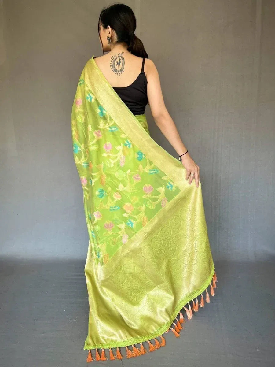 Ravishing Green Zari Woven Organza Events Wear Saree
