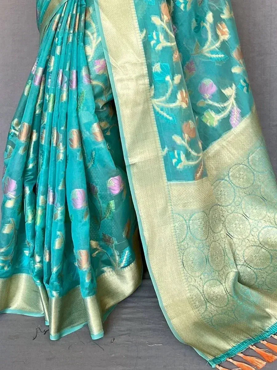 Captivating Teal Blue Woven Tissue Silk Festival Wear Saree
