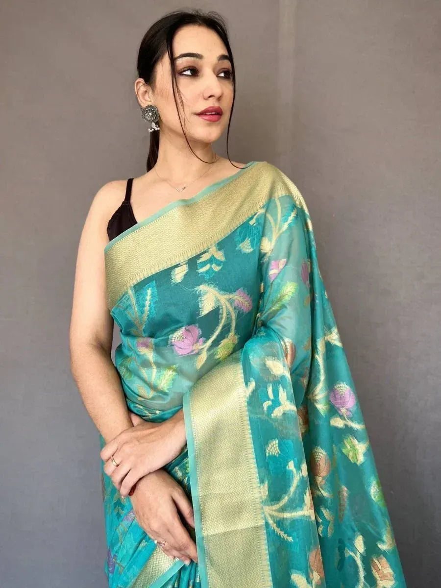 Captivating Teal Blue Woven Tissue Silk Festival Wear Saree