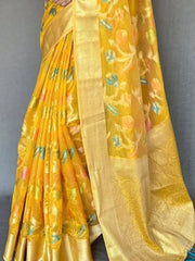 Fascinating Yellow Woven Tissue Silk Occasion Wear Saree