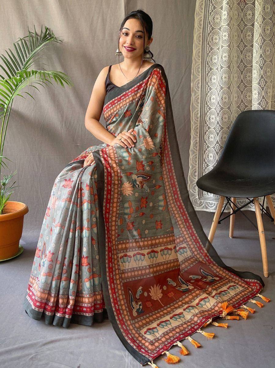 Woman in grey floral saree with red border and tassels, Indian ethnic wear