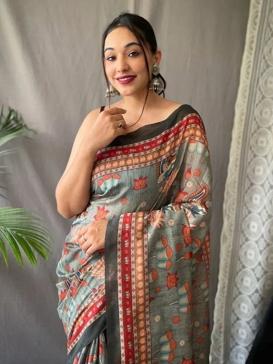 Woman in floral printed saree with red border, ethnic Indian wear for women