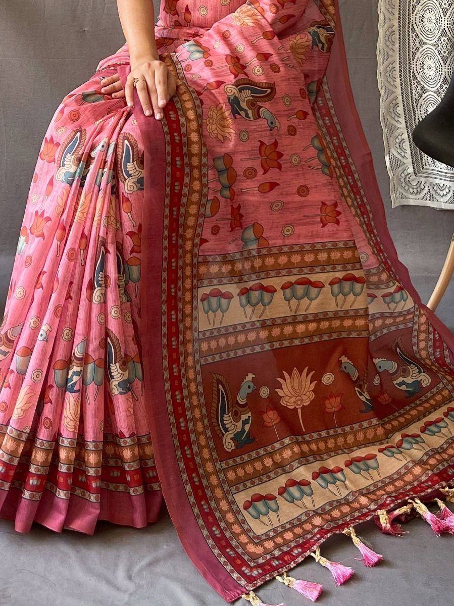 Pink printed saree with peacock and floral motifs, ethnic Indian wear with tassels
