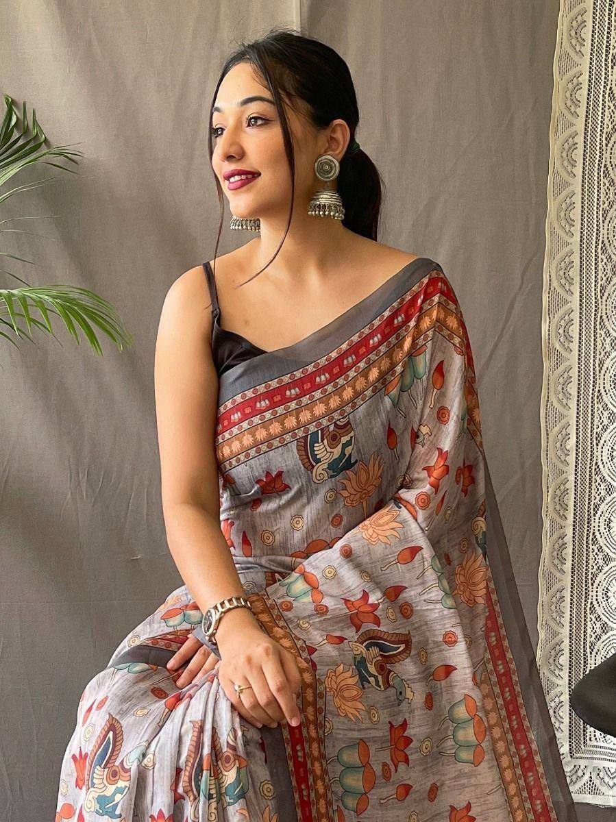 Woman in grey floral printed saree with red border, ethnic wear, traditional Indian attire