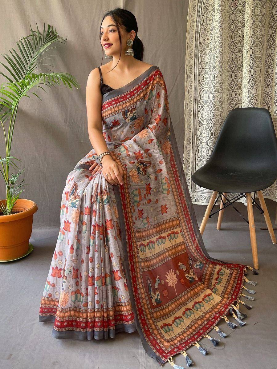 Elegant floral printed saree with tassels, perfect for ethnic occasions