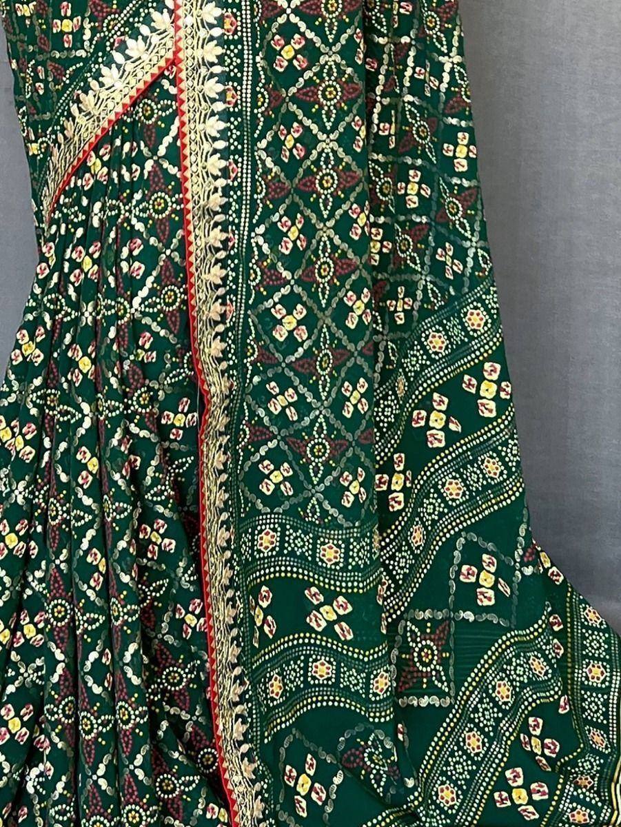 Green ethnic lehenga with intricate floral and geometric prints, perfect for Indian weddings and festive occasions.