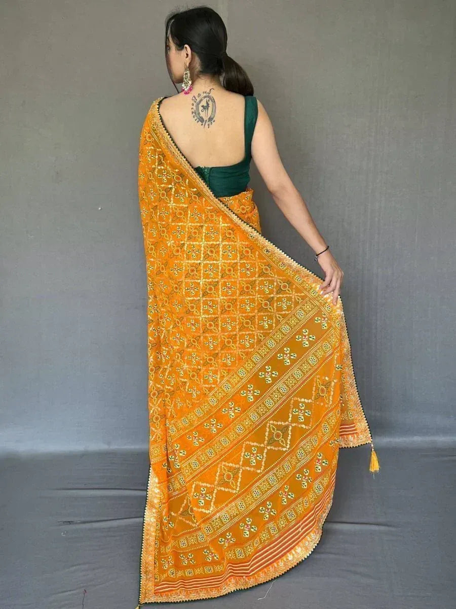 Orange embroidered saree with green blouse, ethnic Indian wear for women