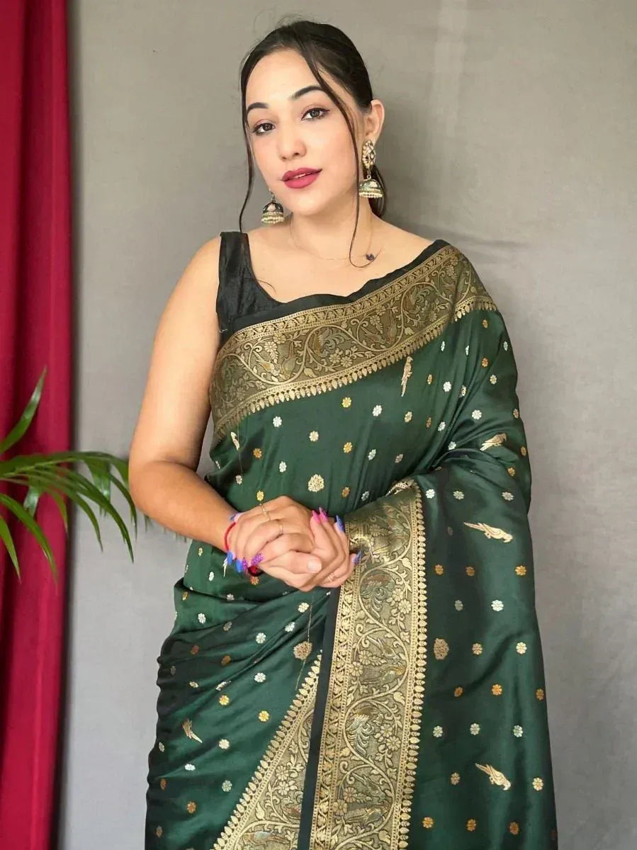 Elegant green saree with gold embroidery and black blouse, perfect for Indian ethnic occasions.