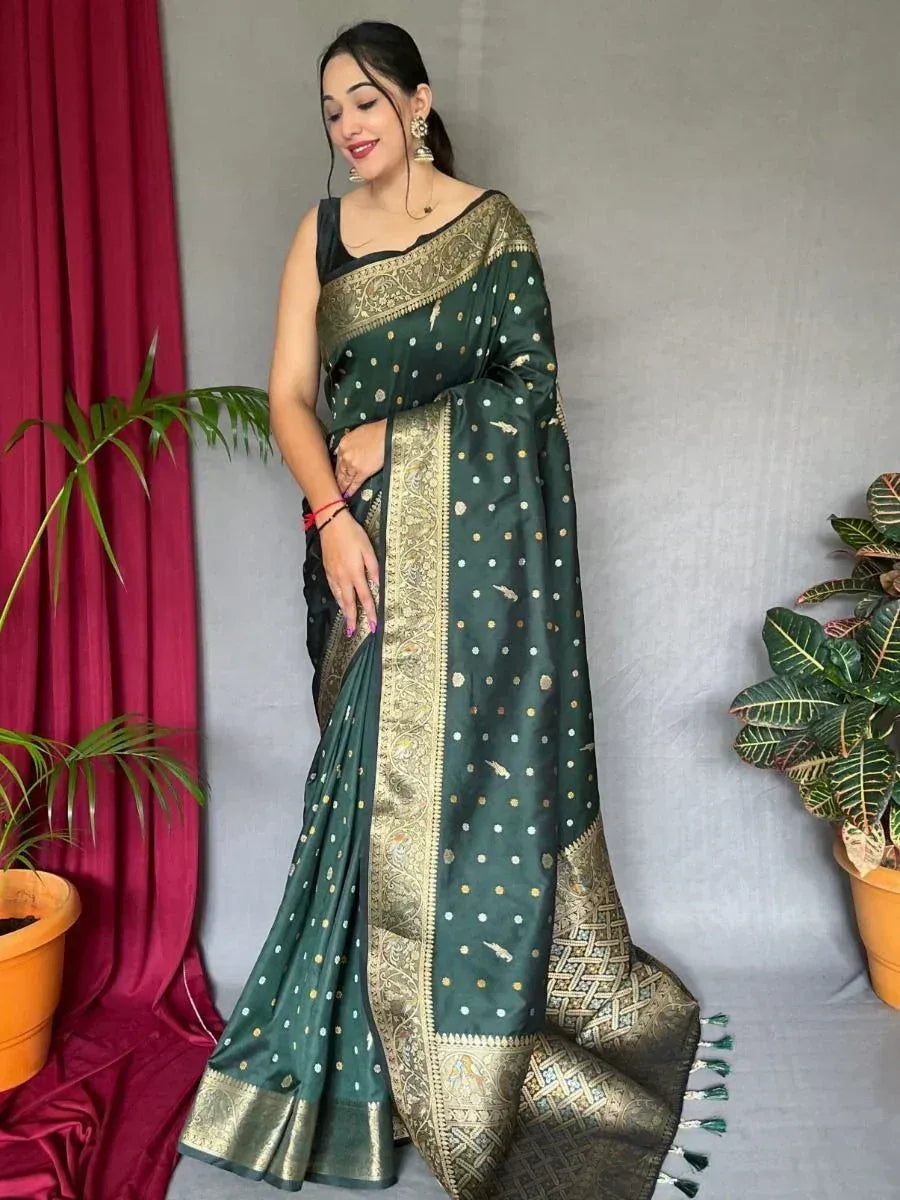 Elegant green saree with gold embroidery and border, perfect for Indian ethnic occasions