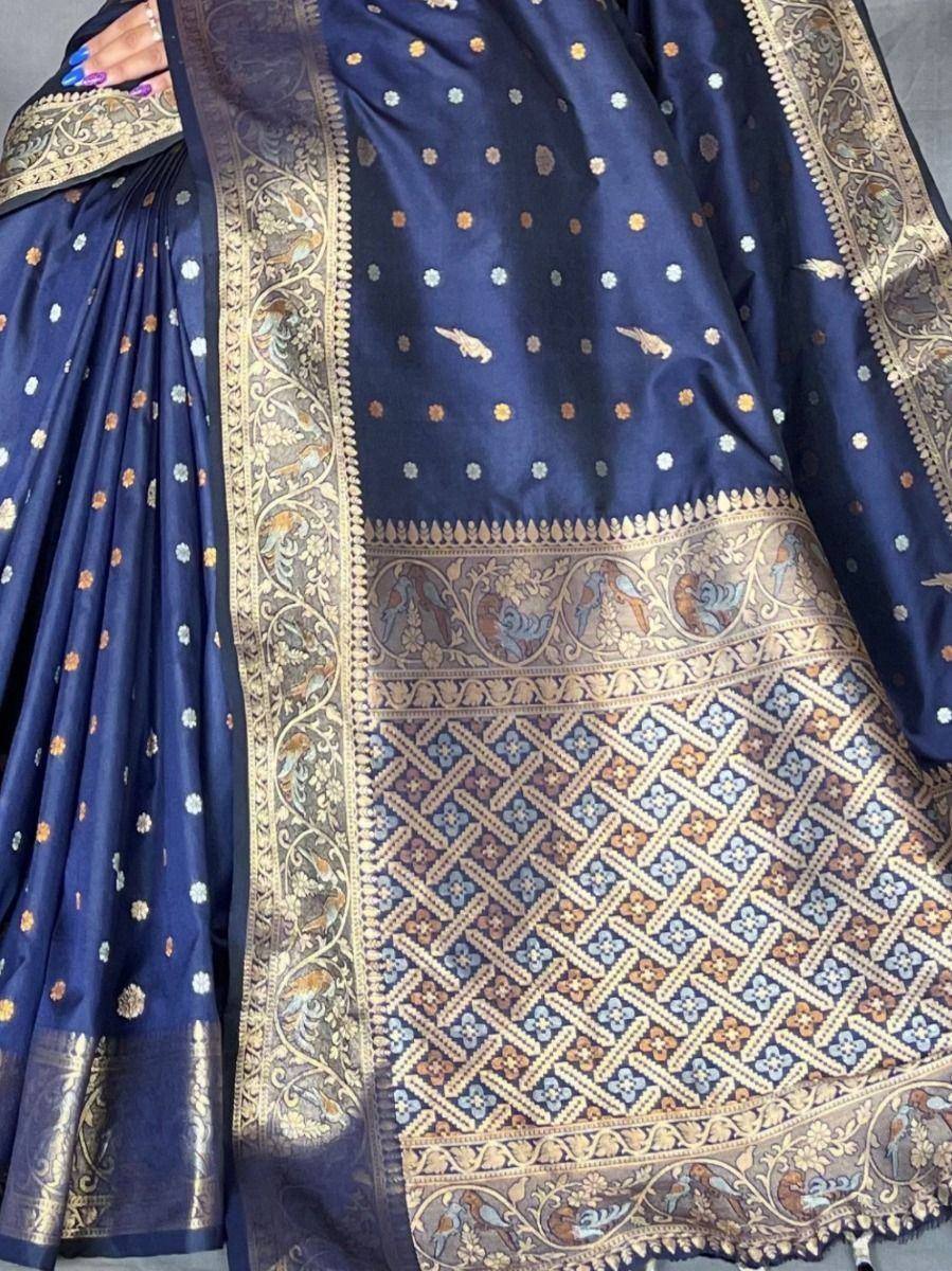 Navy blue ethnic saree with gold floral and bird motifs, intricate border, perfect for Indian occasions