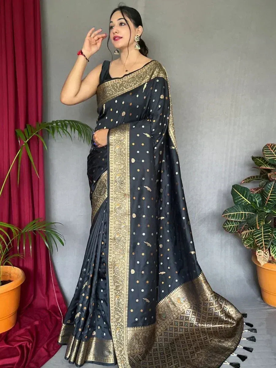 Black and gold designer saree with intricate embroidery, perfect for ethnic occasions