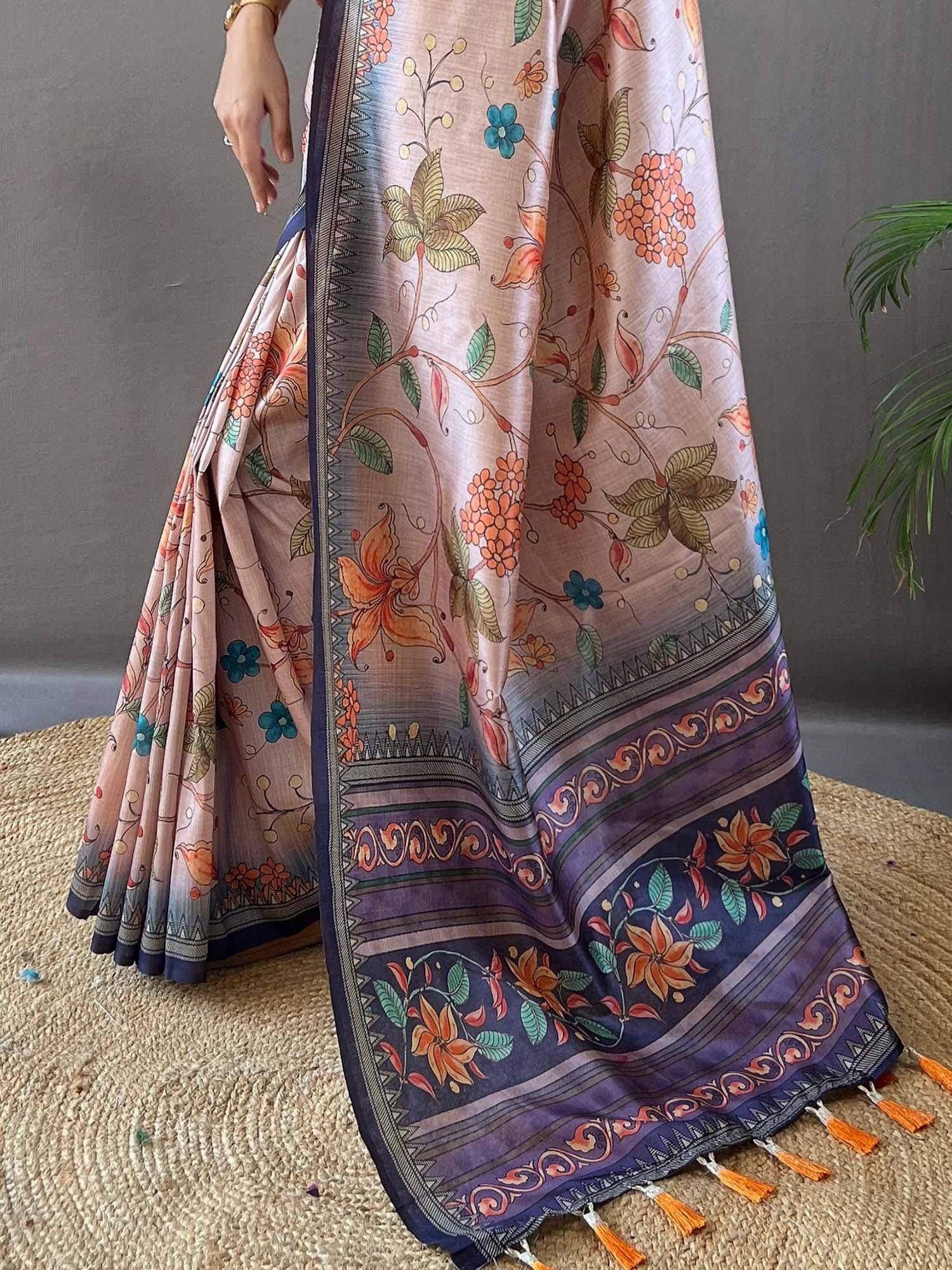 Floral printed ethnic saree with navy border and tassels, ideal for Indian occasions