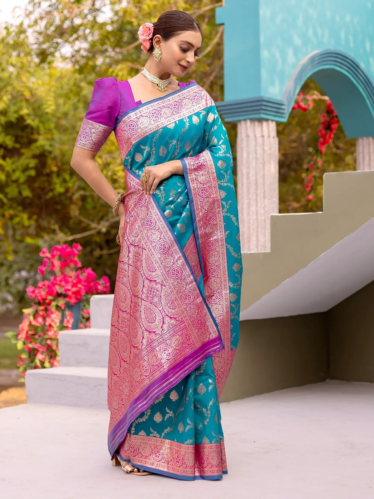 Teal and pink designer saree with gold zari work, perfect for Indian ethnic occasions