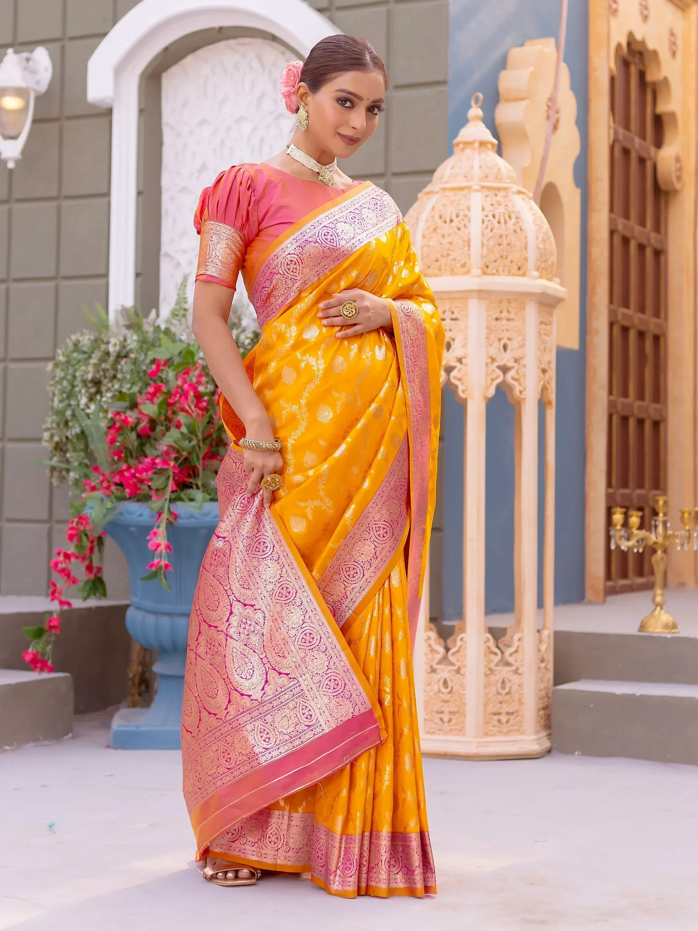 Yellow and pink designer saree with gold embroidery, perfect for Indian ethnic wear occasions