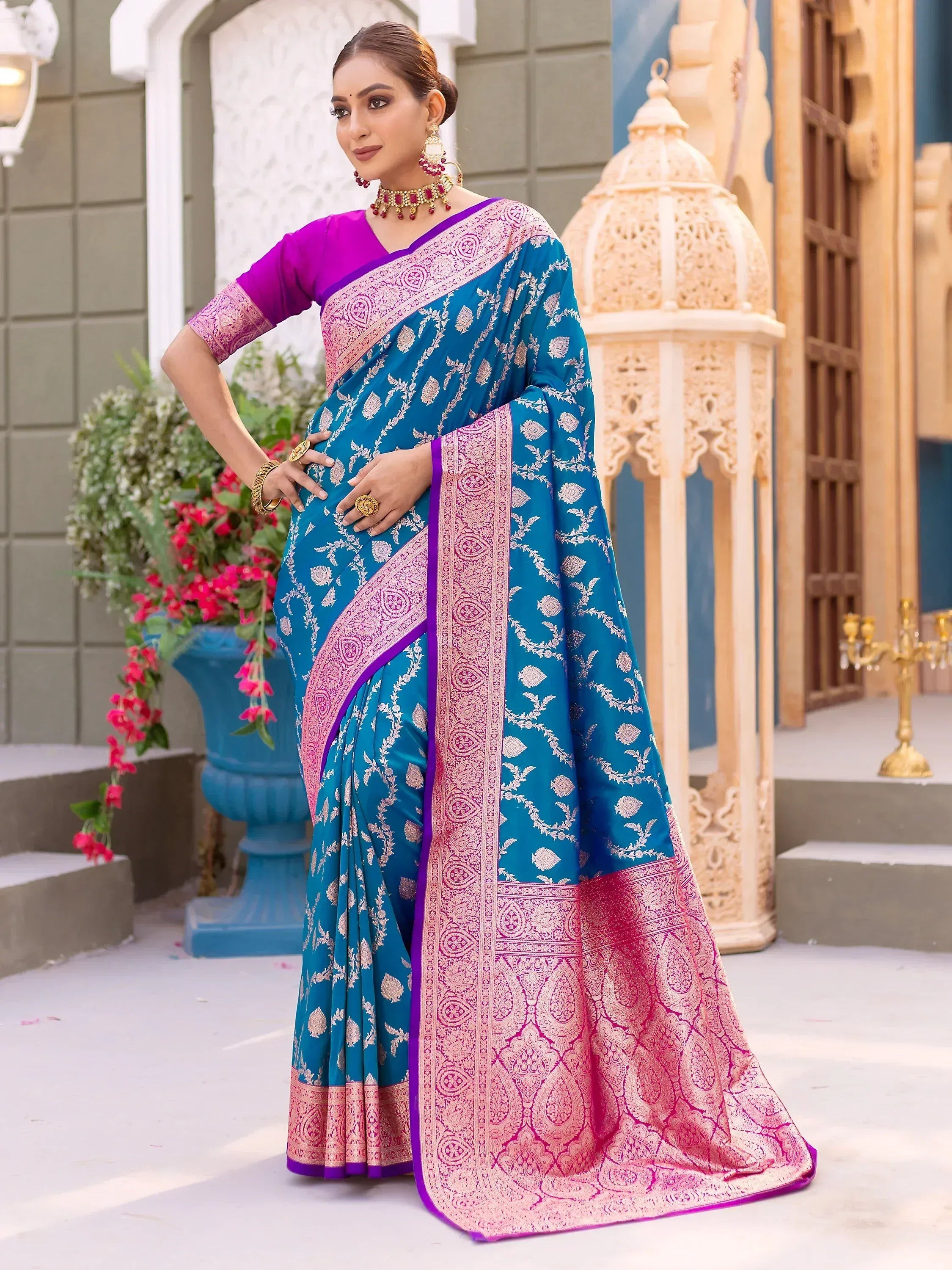 Teal and pink designer saree with gold floral print and purple blouse, ethnic wear for women