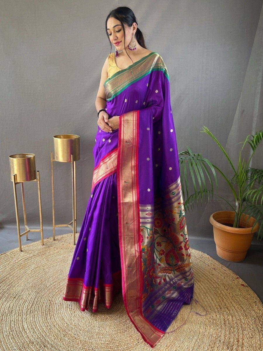 Purple ethnic saree with floral border and gold blouse, perfect for Indian occasions