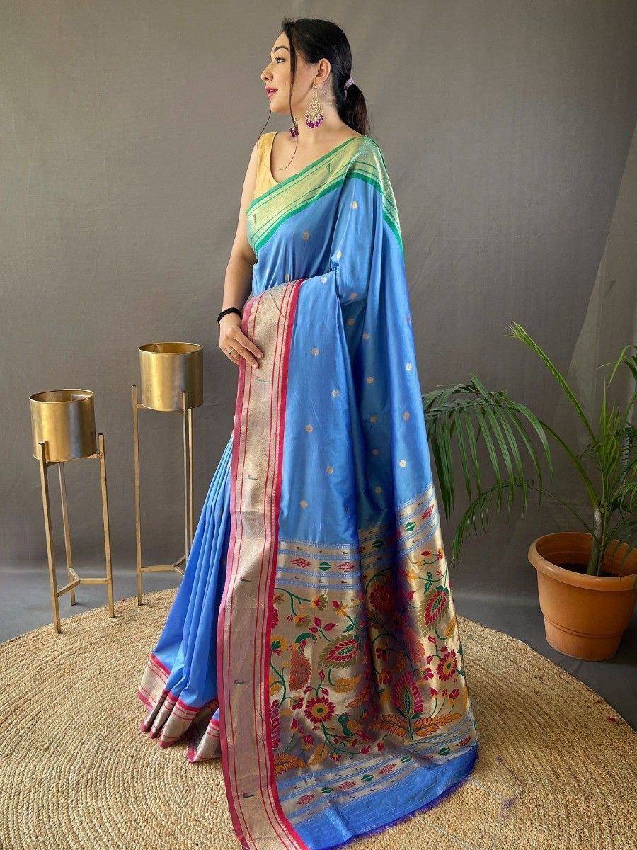 Blue floral embroidered saree with gold border, styled with yellow blouse for Indian ethnic wear