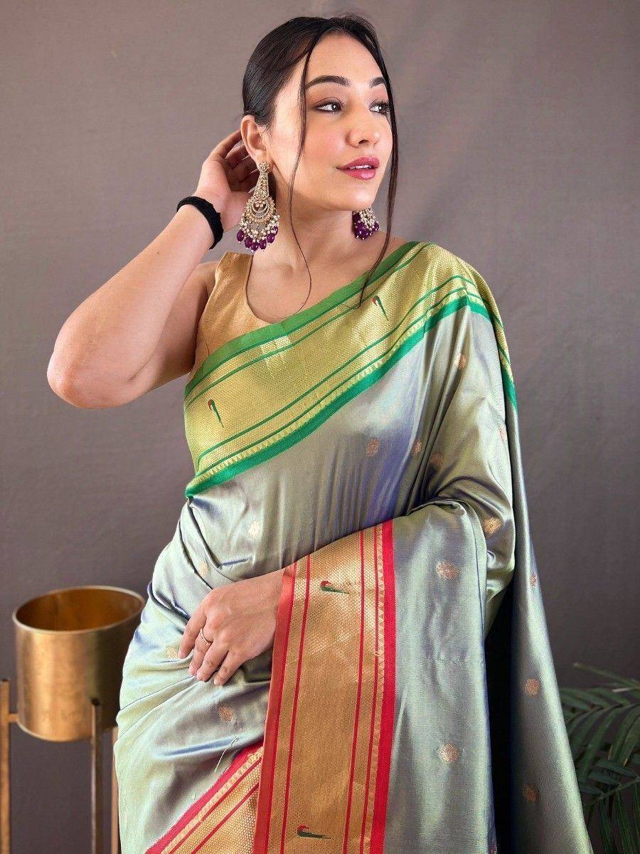 Elegant green and gold saree with temple border, perfect for Indian ethnic occasions and festive wear.