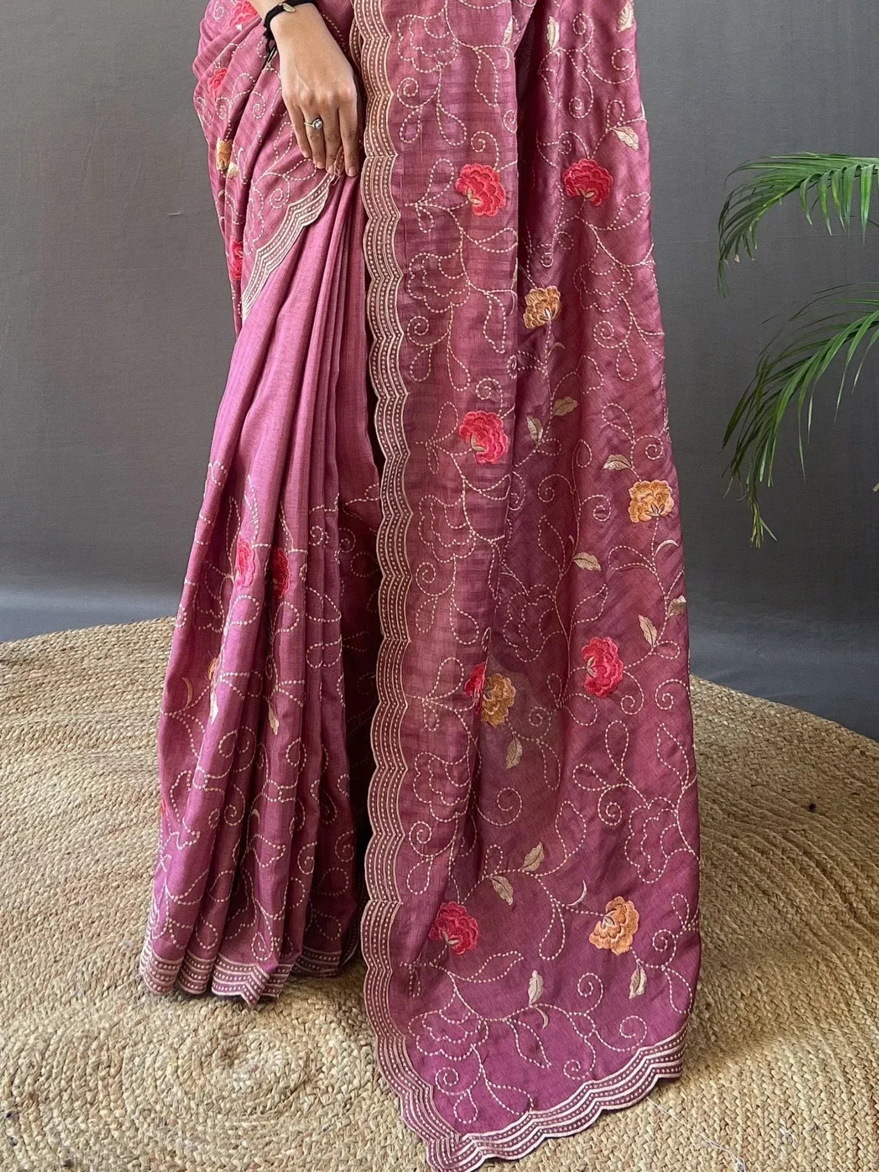 Pink embroidered saree with floral motifs and scalloped border, Indian ethnic wear