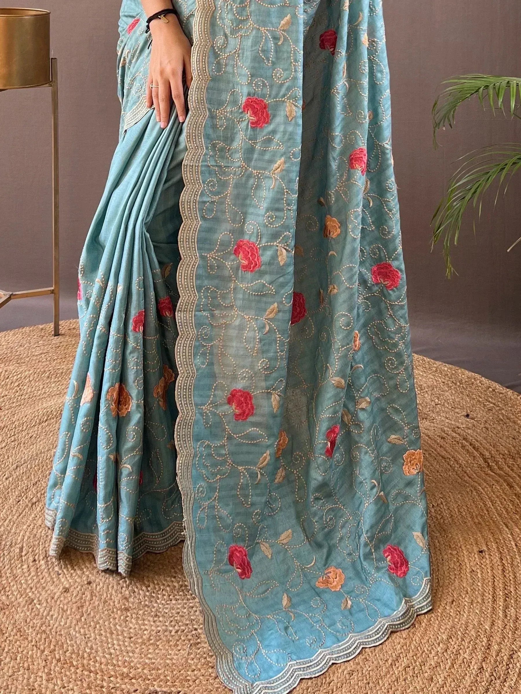 Teal saree with floral embroidery and scalloped border, Indian ethnic wear for women