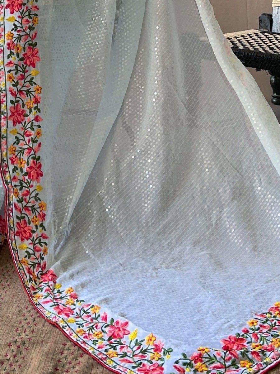 White sheer lehenga with floral embroidery and sequin detailing, ethnic Indian wear