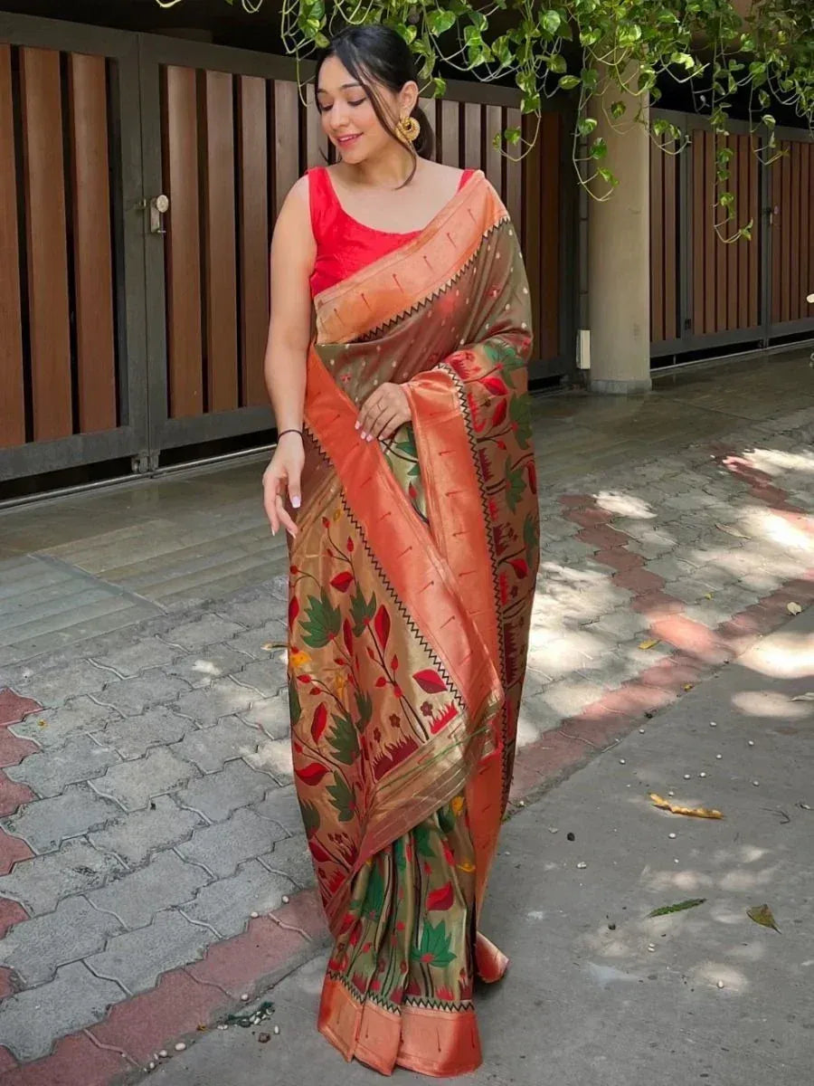 Woman in floral print saree with red blouse, ethnic Indian wear for festive occasions