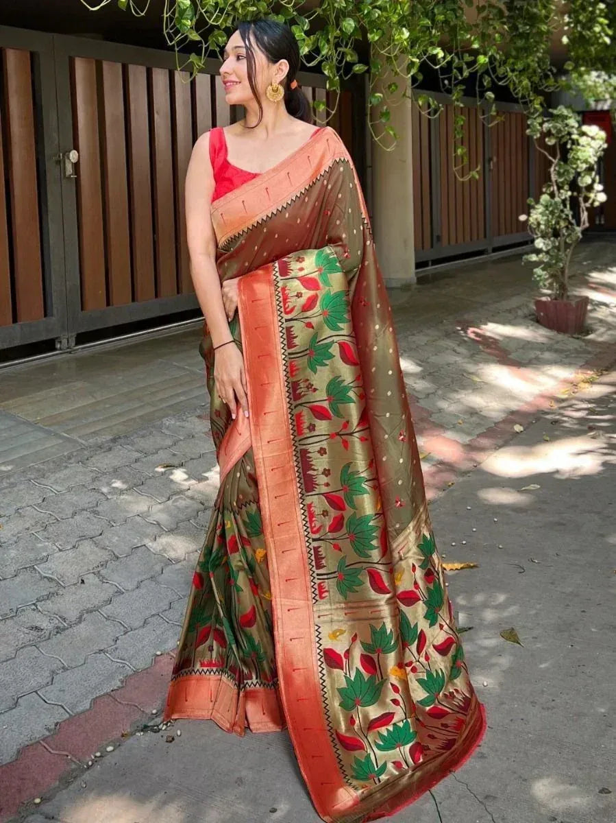 Woman in floral print saree with red blouse, ethnic Indian wear for festive occasions