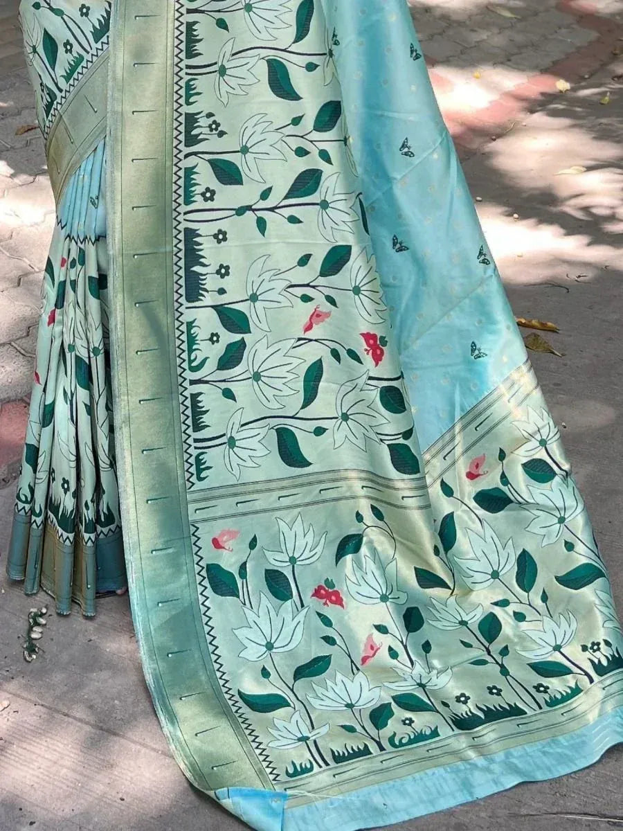 Light green floral print saree with blue border, ethnic Indian wear for women