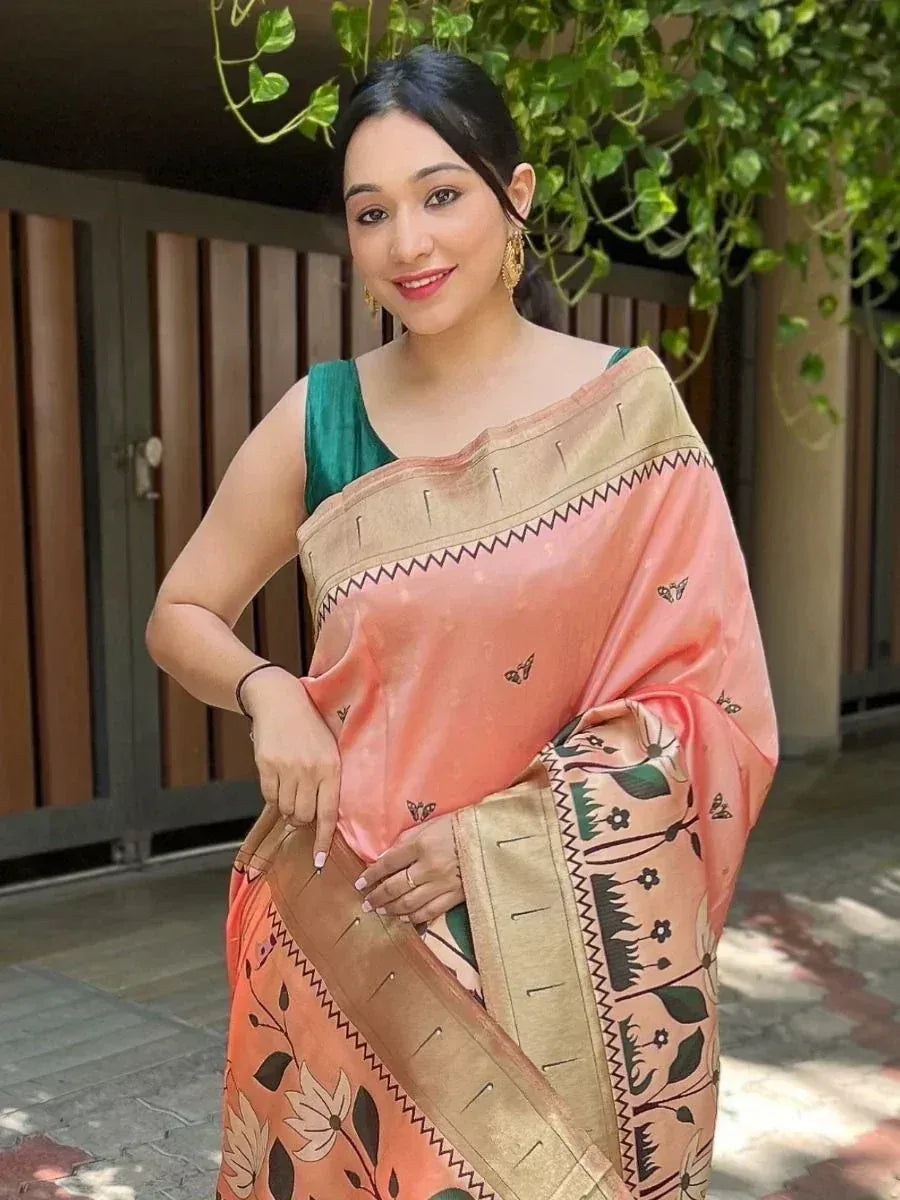 Woman in peach floral saree with green blouse, ethnic Indian wear for festive occasions