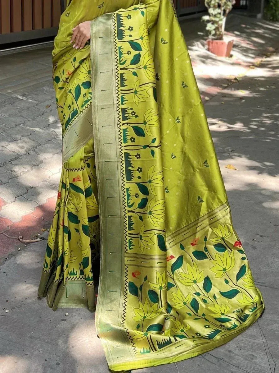 Vibrant green floral printed saree with ethnic border, perfect for Indian occasions