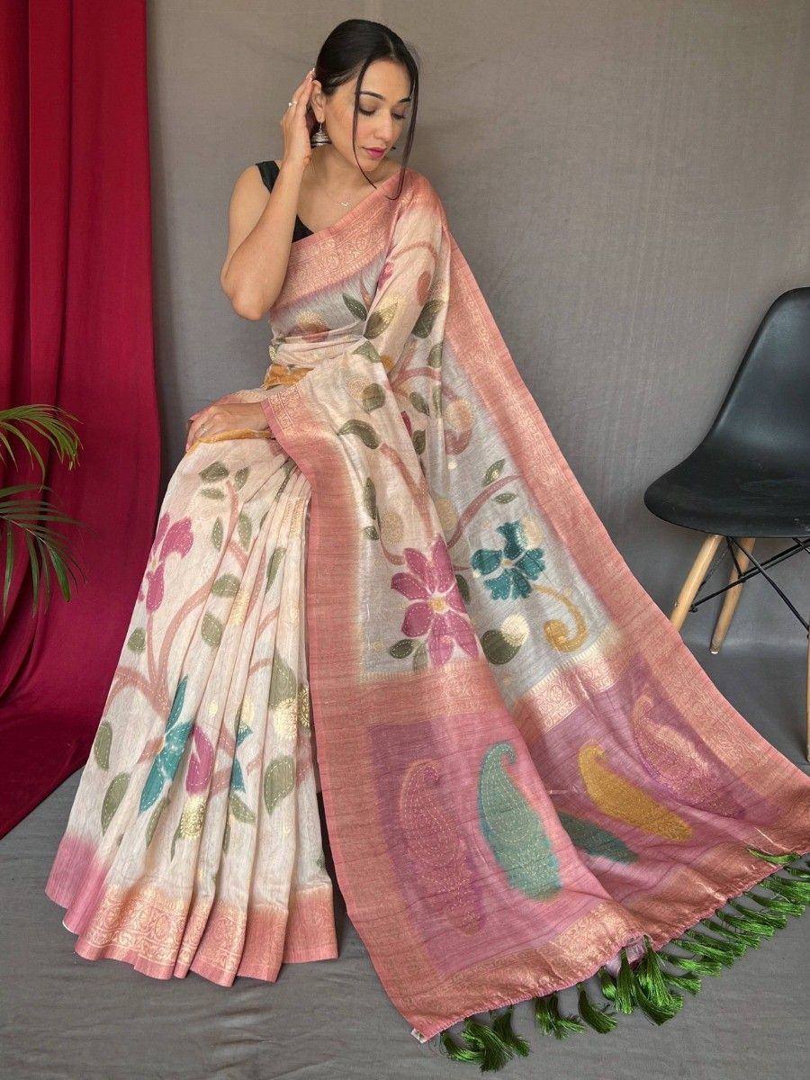 Floral printed ethnic saree with pink border and green tassels, styled with black blouse