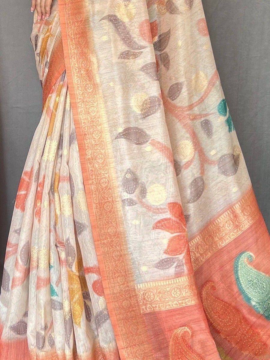 Elegant floral print saree with orange border and paisley motifs, ideal for ethnic occasions