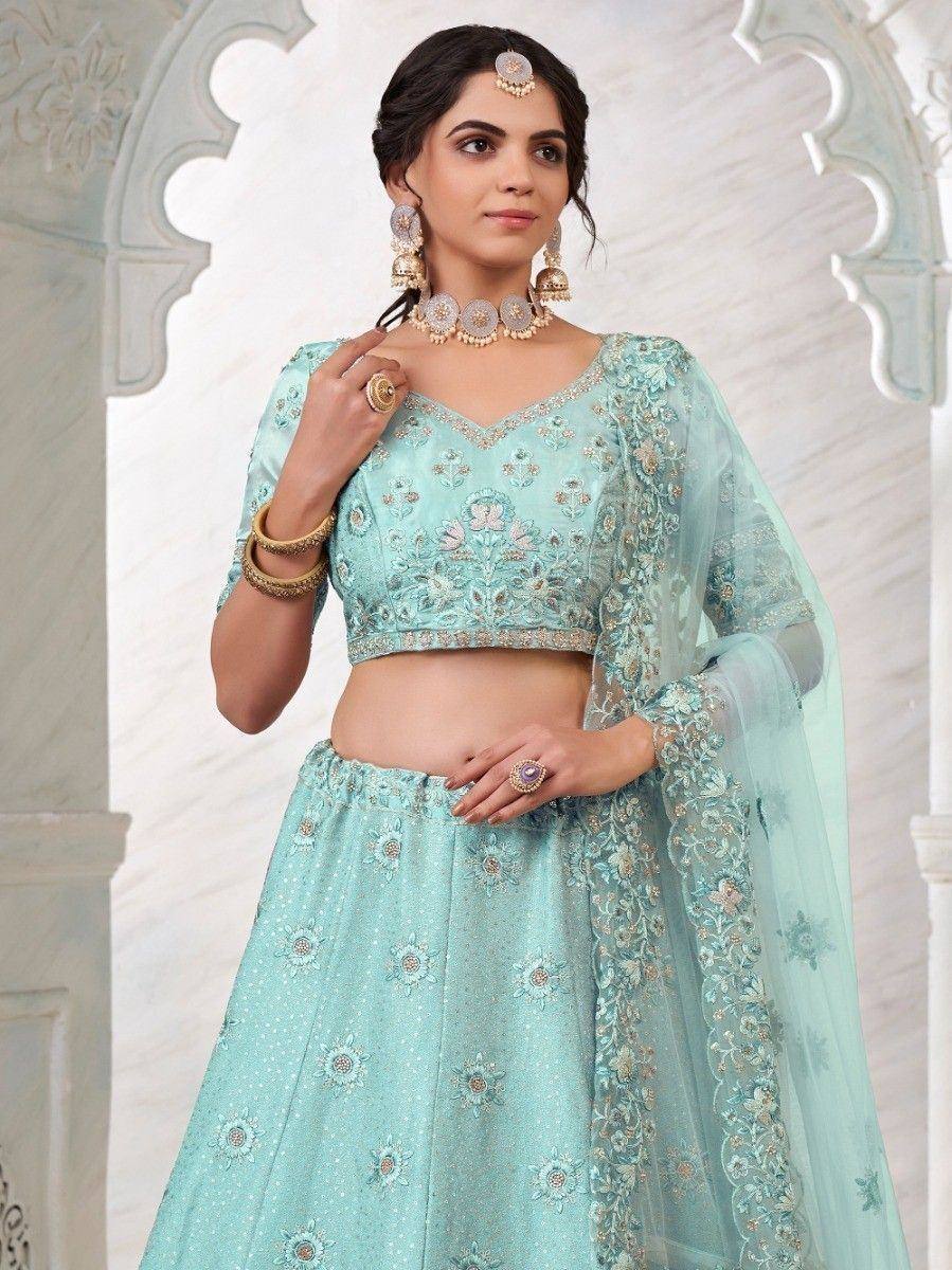 Mint green embroidered lehenga choli with sheer dupatta, perfect for Indian weddings and festive occasions